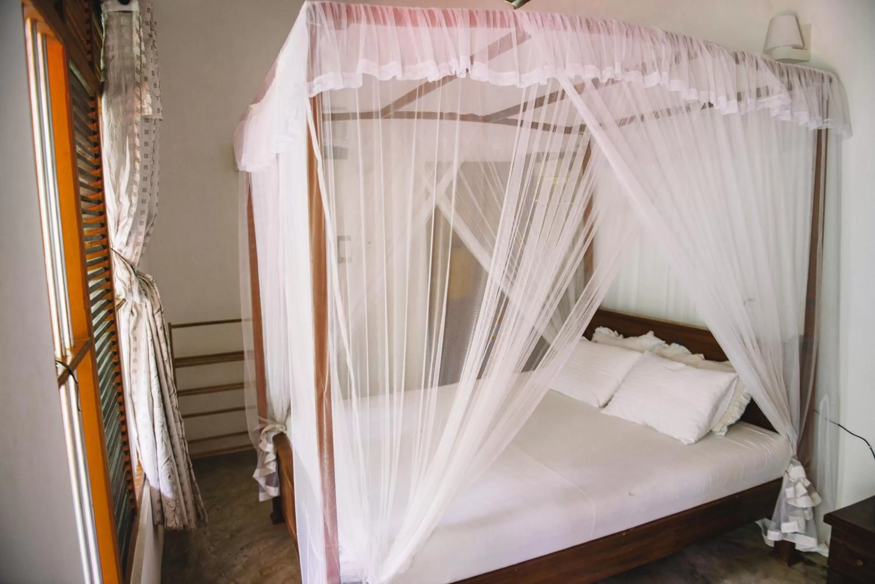Bed in Kadolana Guest House