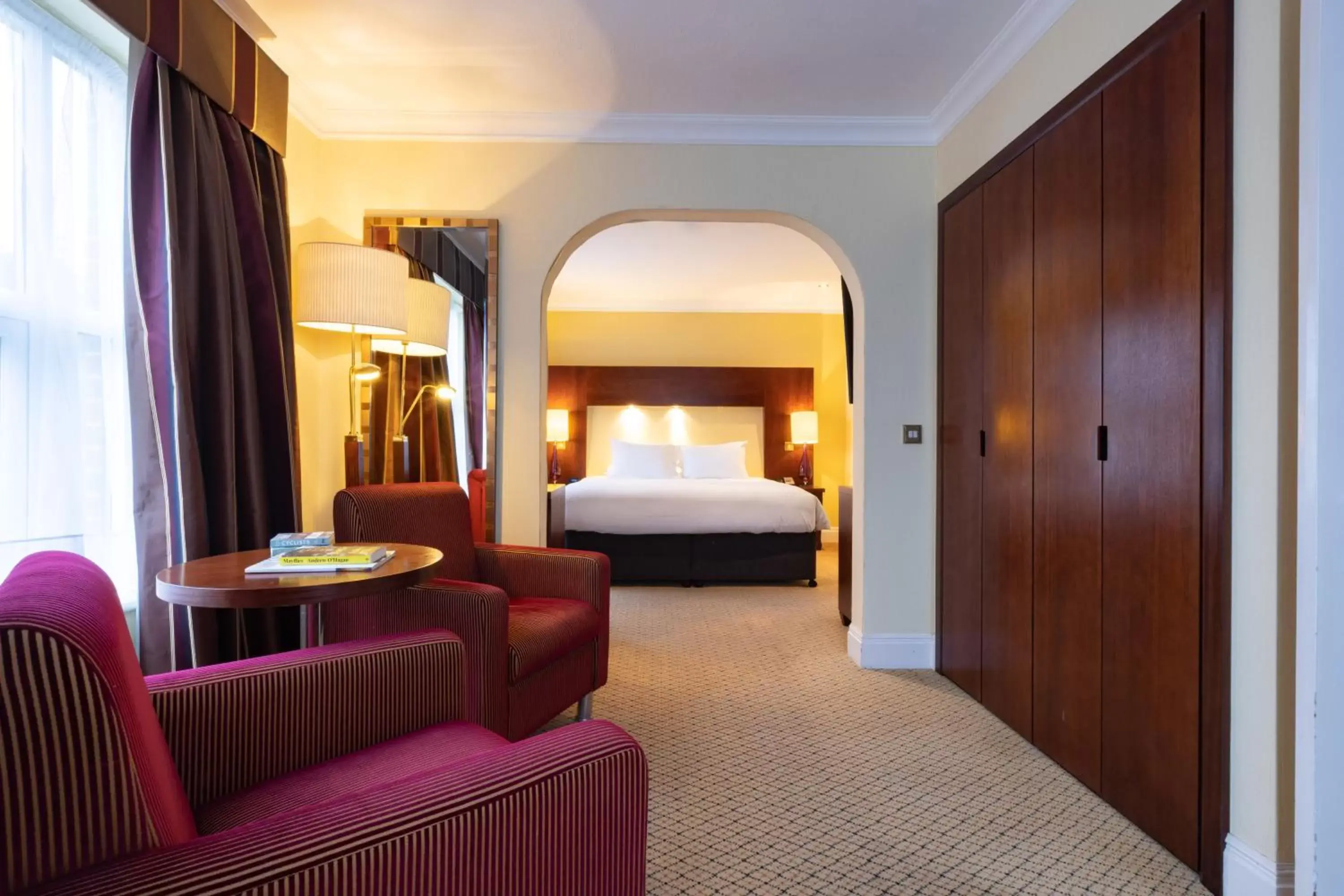 Bed, Seating Area in Avisford Park Hotel