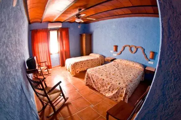 Triple Room with Pool View in Hotel Rural El Cortijo