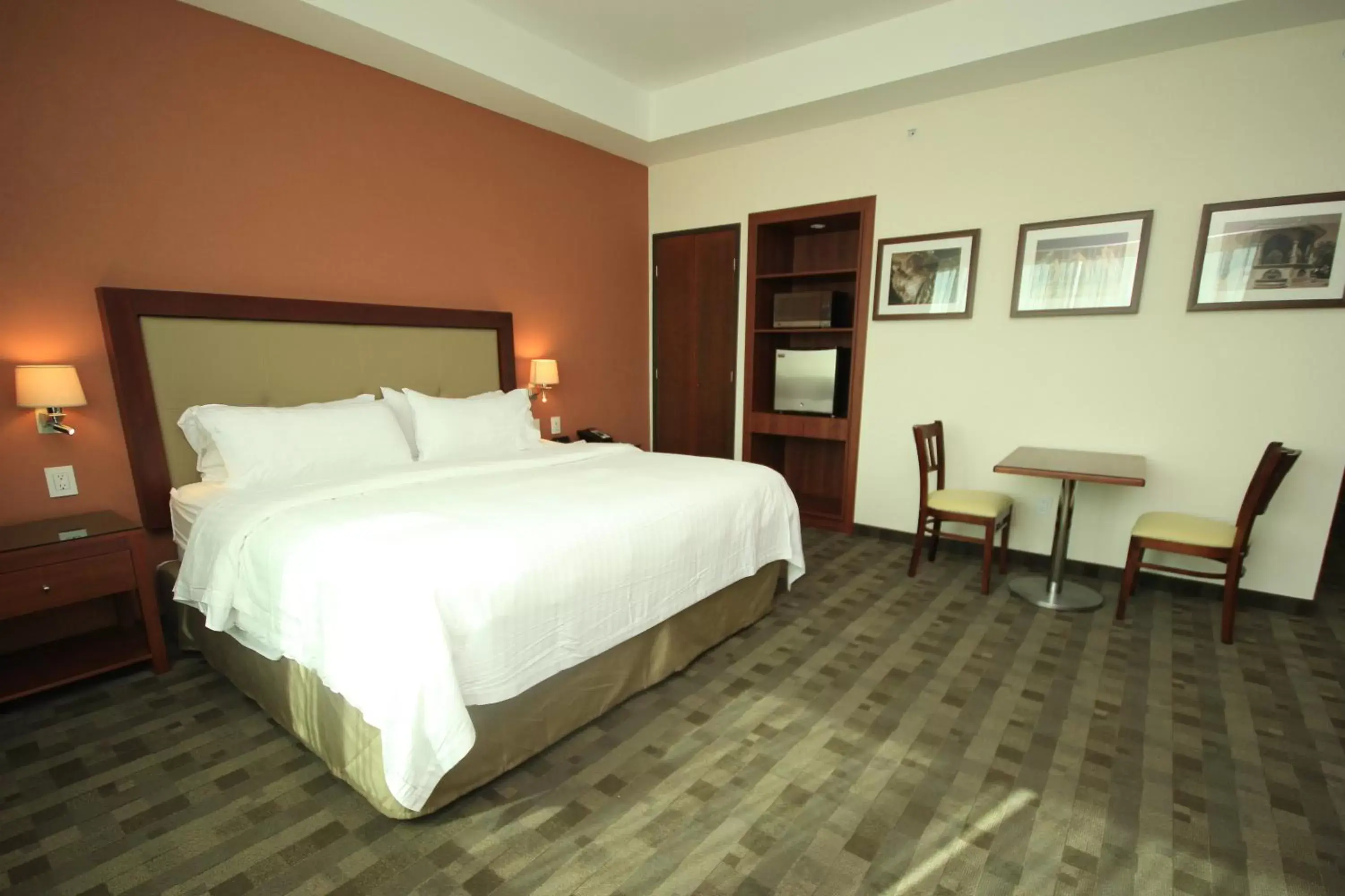 Photo of the whole room, Bed in Holiday Inn & Suites Plaza Mayor, an IHG Hotel