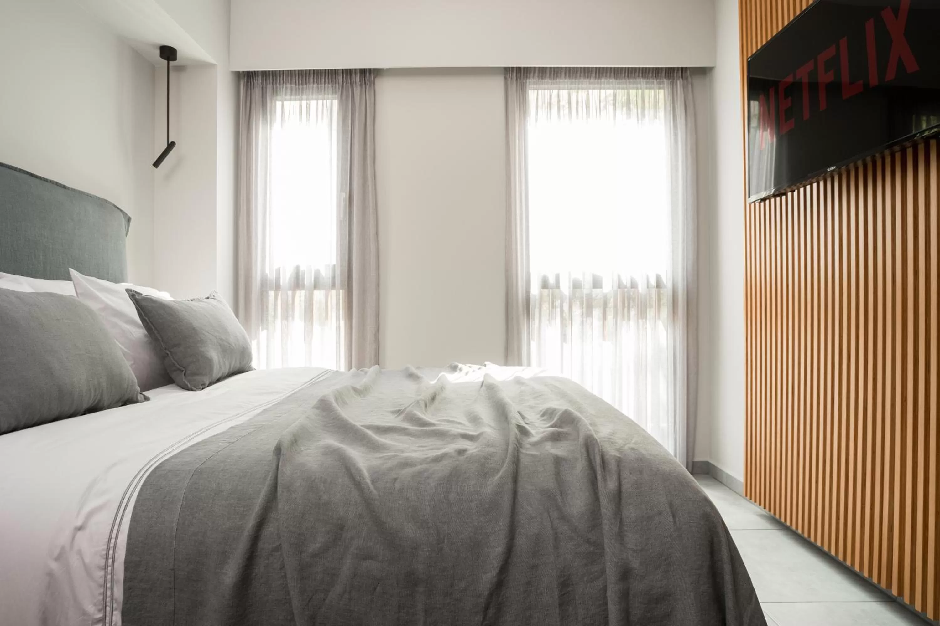 Bed in 11 Enteka Acropolis Suites