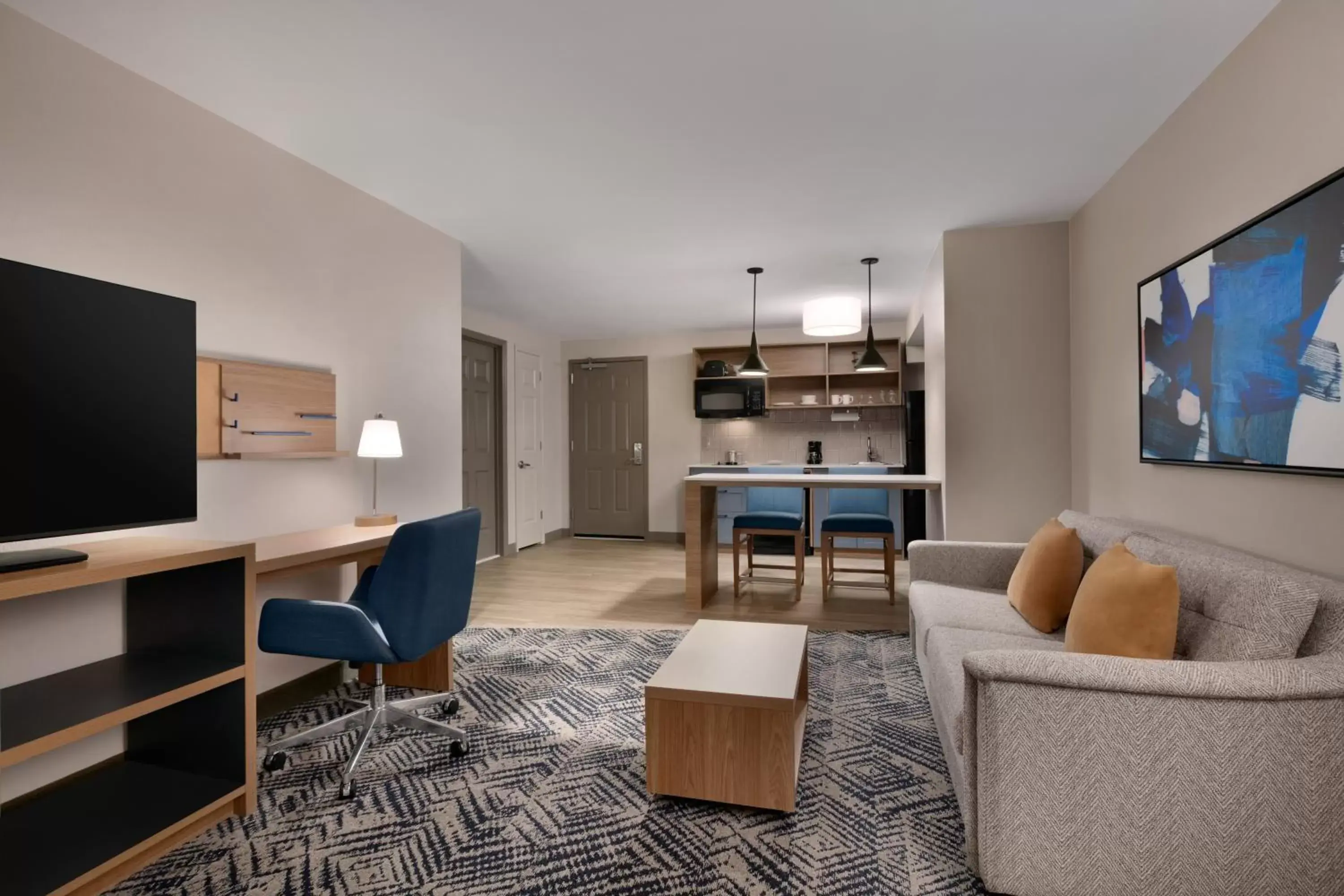 Living room, Seating Area in Candlewood Suites - Asheville Downtown, an IHG Hotel