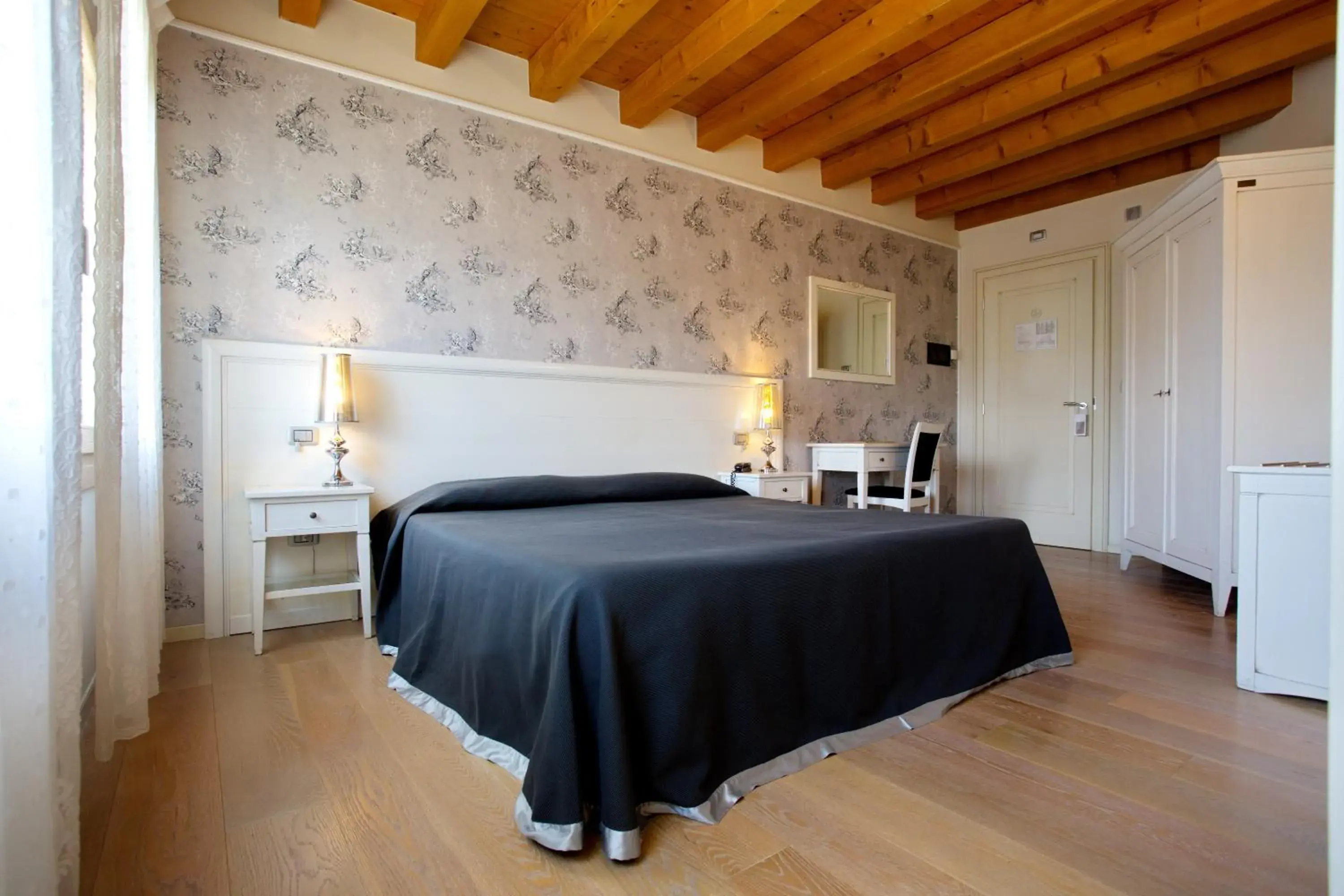 Bed in Hotel Asolo