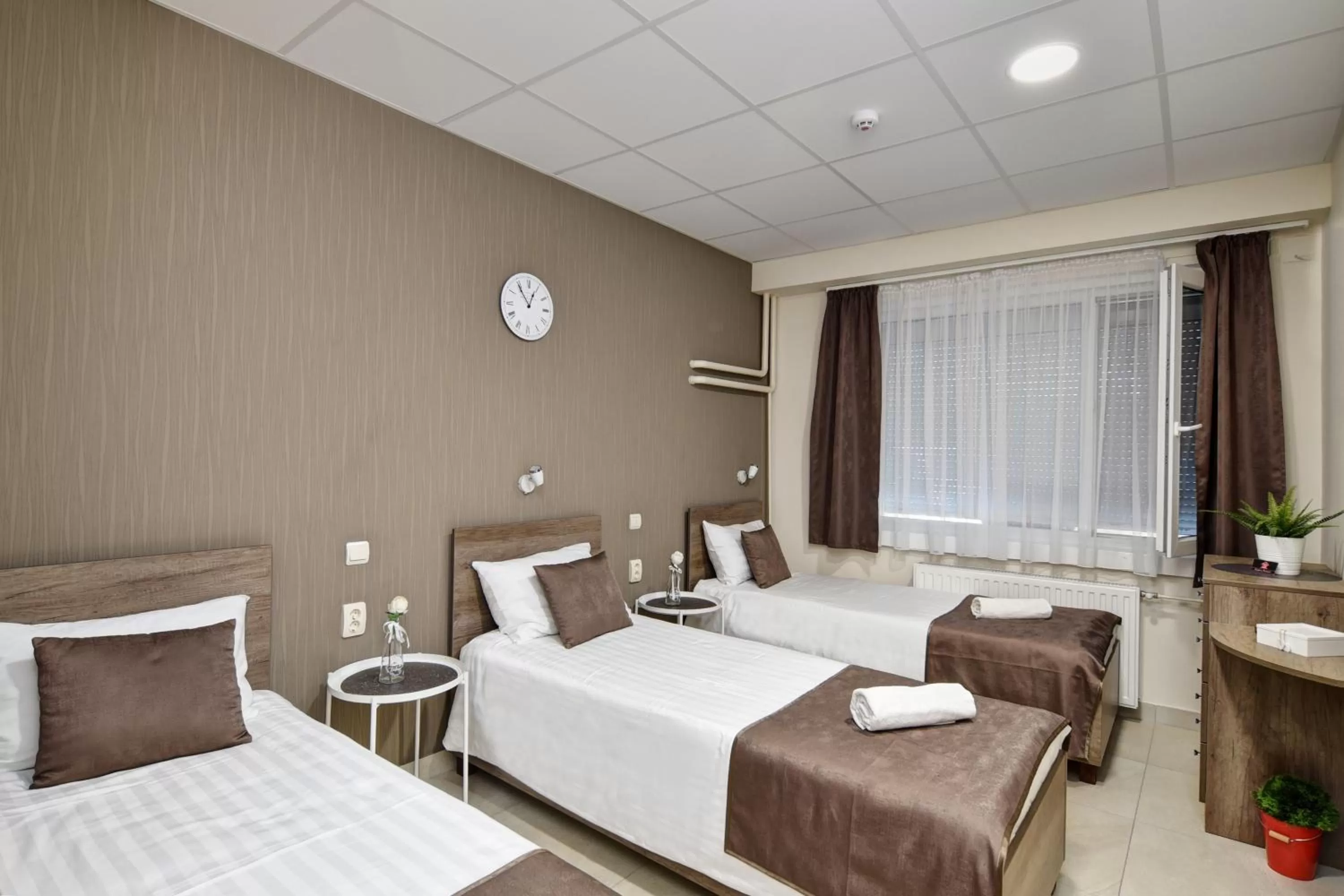 Bed in Familia Panzió & Apartmanház Győr