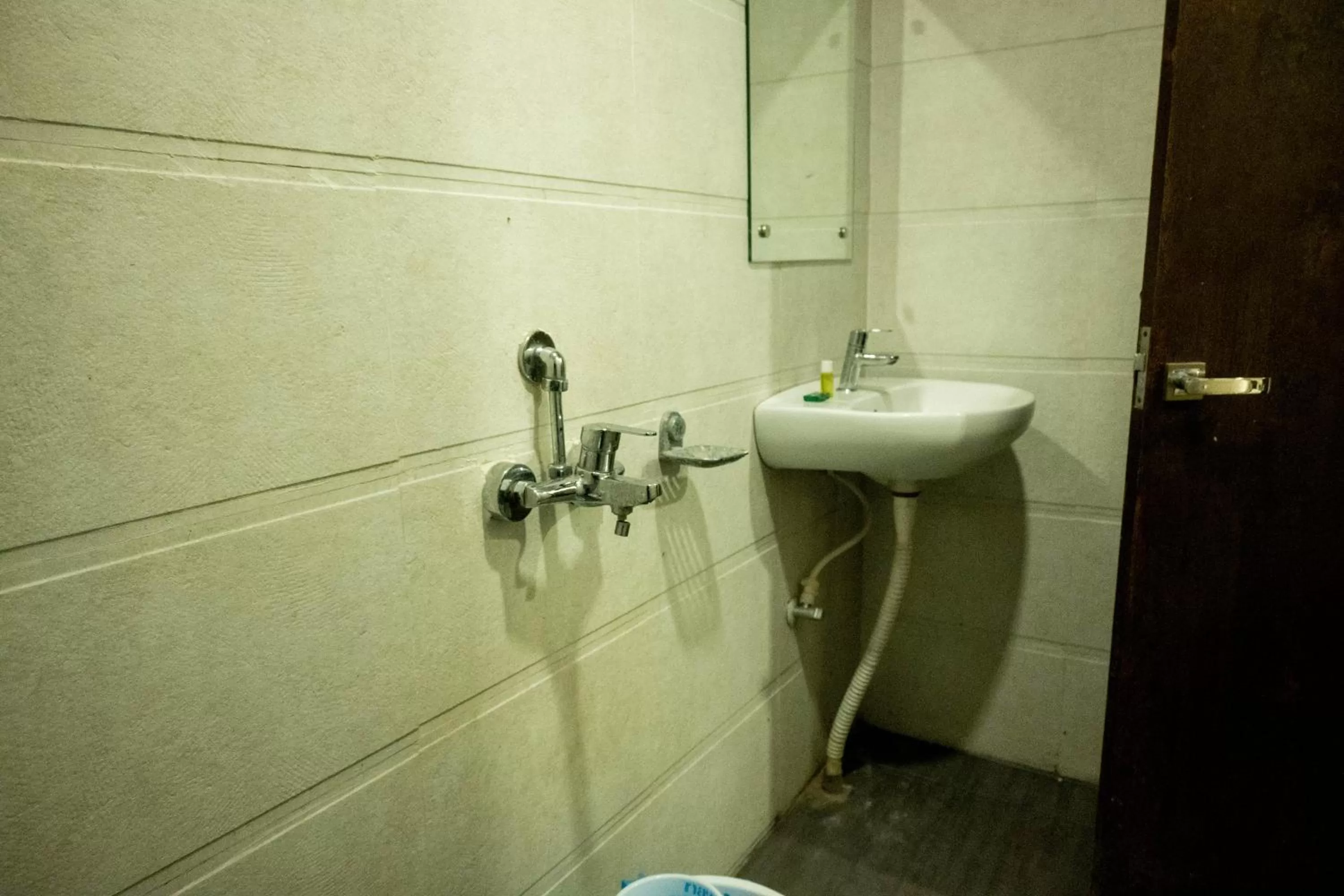 Bathroom in Vinayak Bhavan By Vinayak Hotels