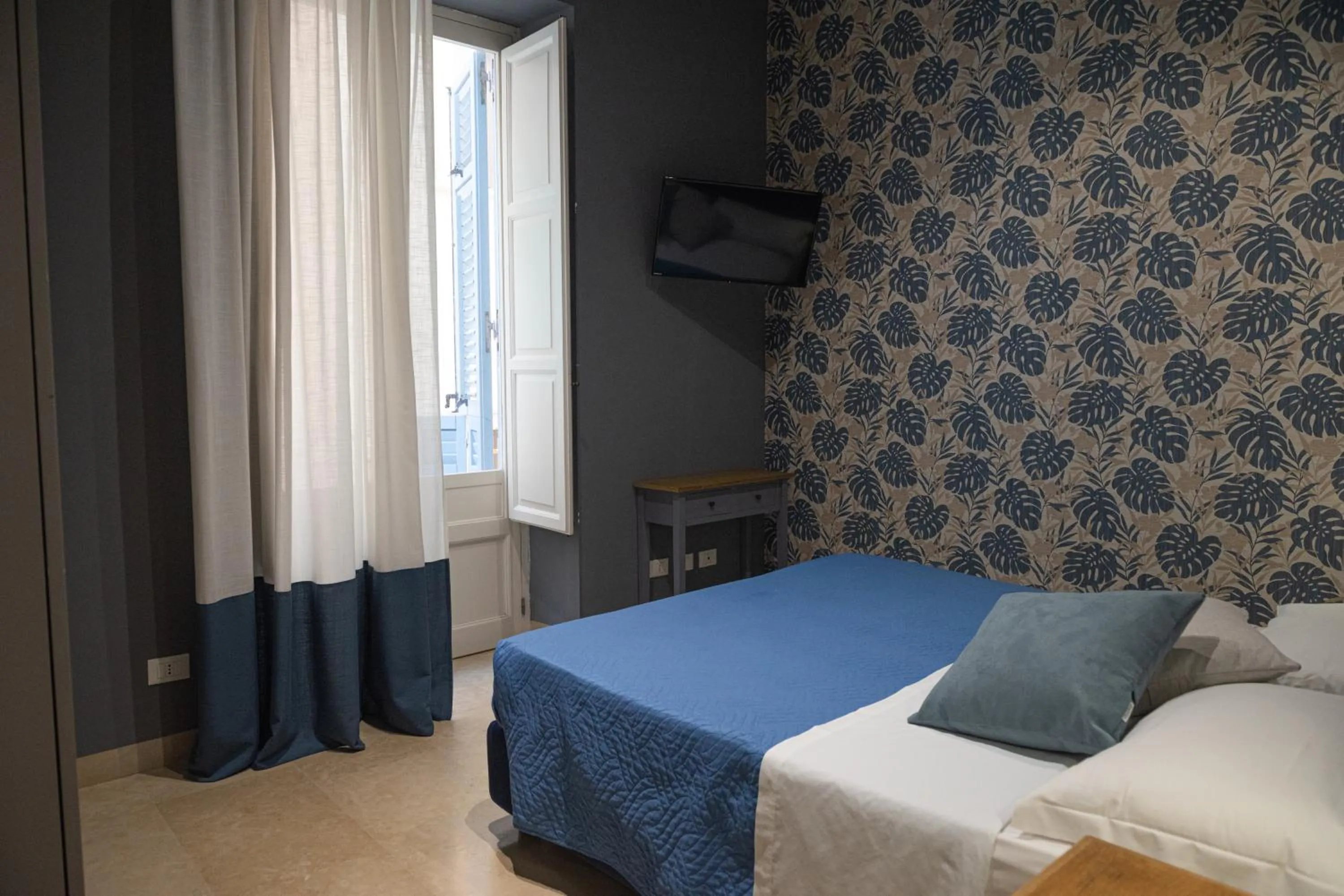 Bedroom, Bed in ZIBIBBO SUITES & ROOMS - Aparthotel in Centro Storico a Trapani