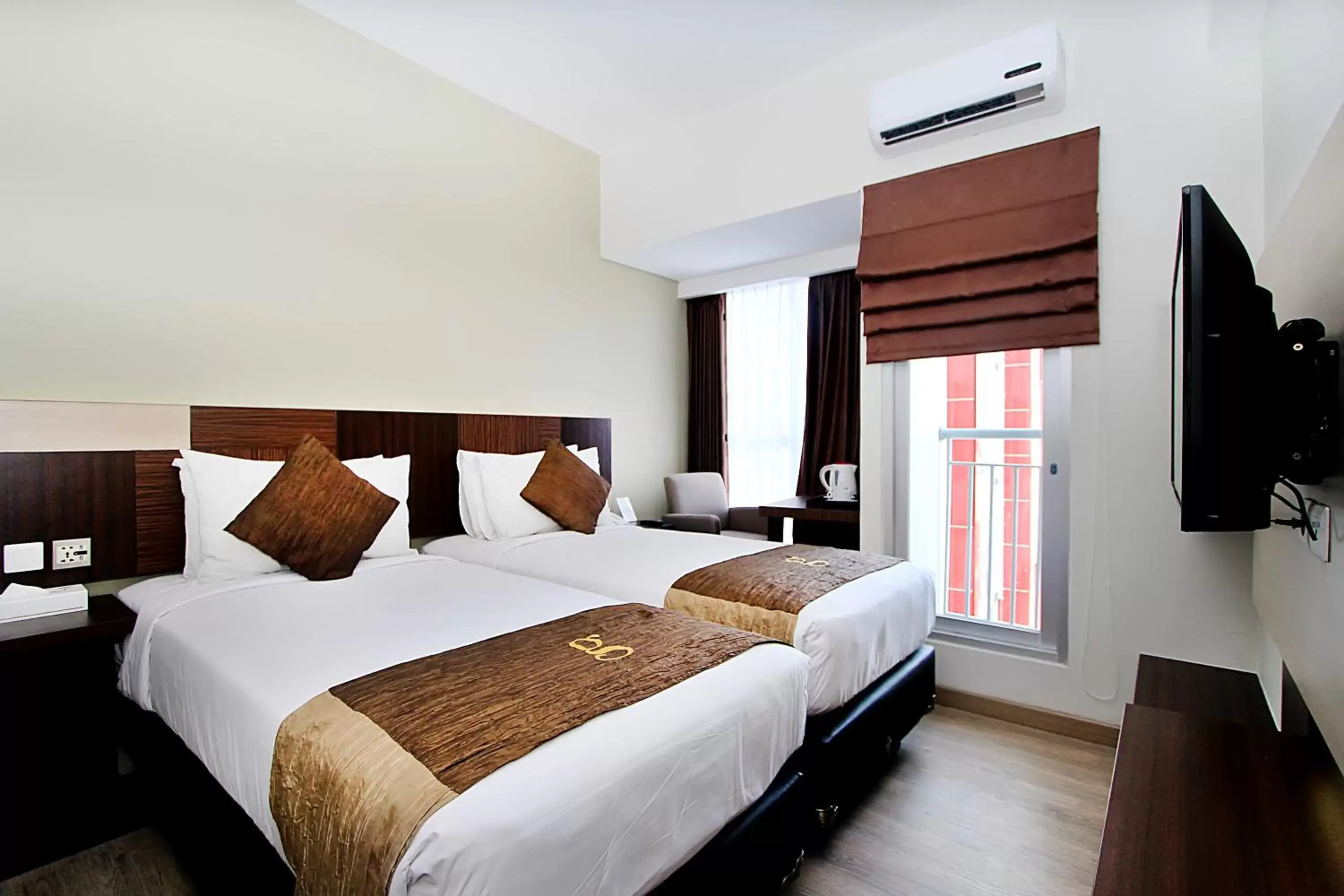Bed in Hotel Gunawangsa MERR