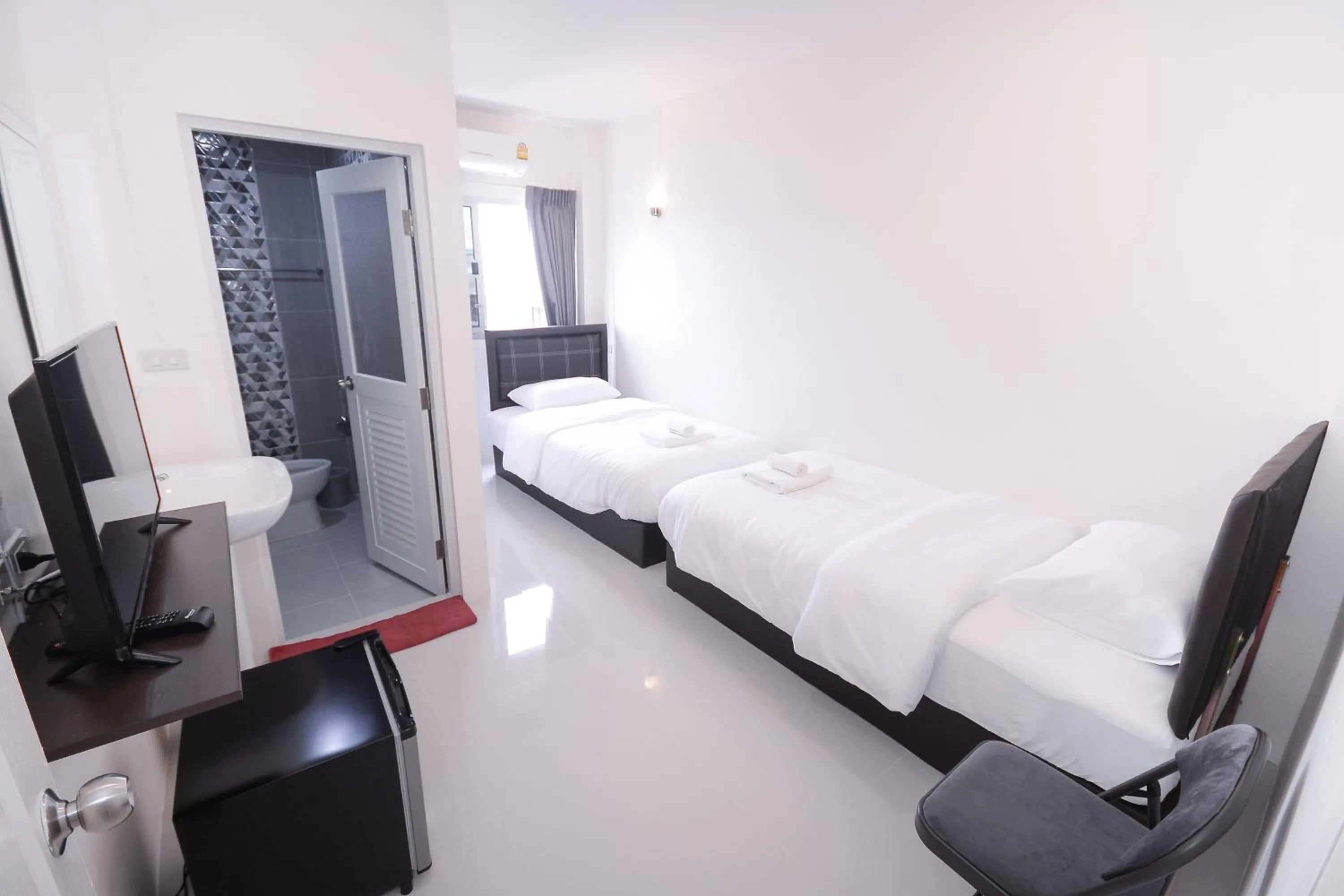 Bed in U-need Guesthouse95