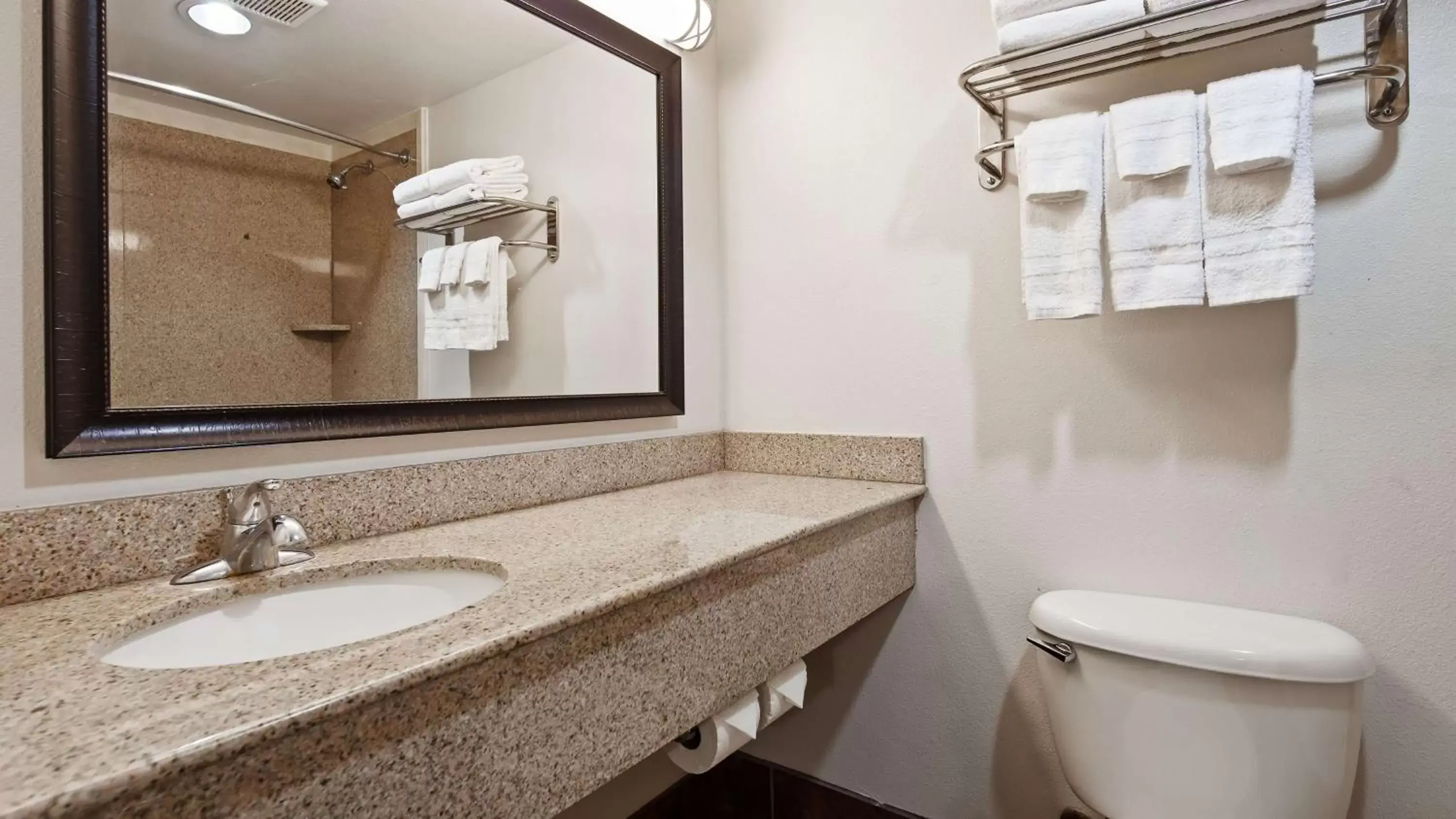 Bathroom in SureStay Plus Hotel by Best Western Lubbock Medical Center