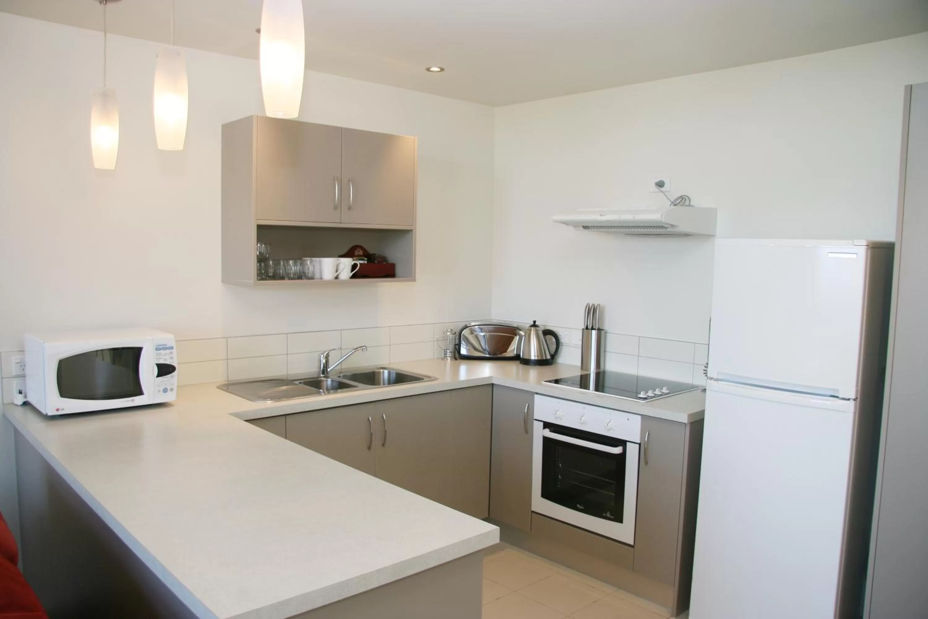 Kitchen or kitchenette in Oceans Resort Whitianga
