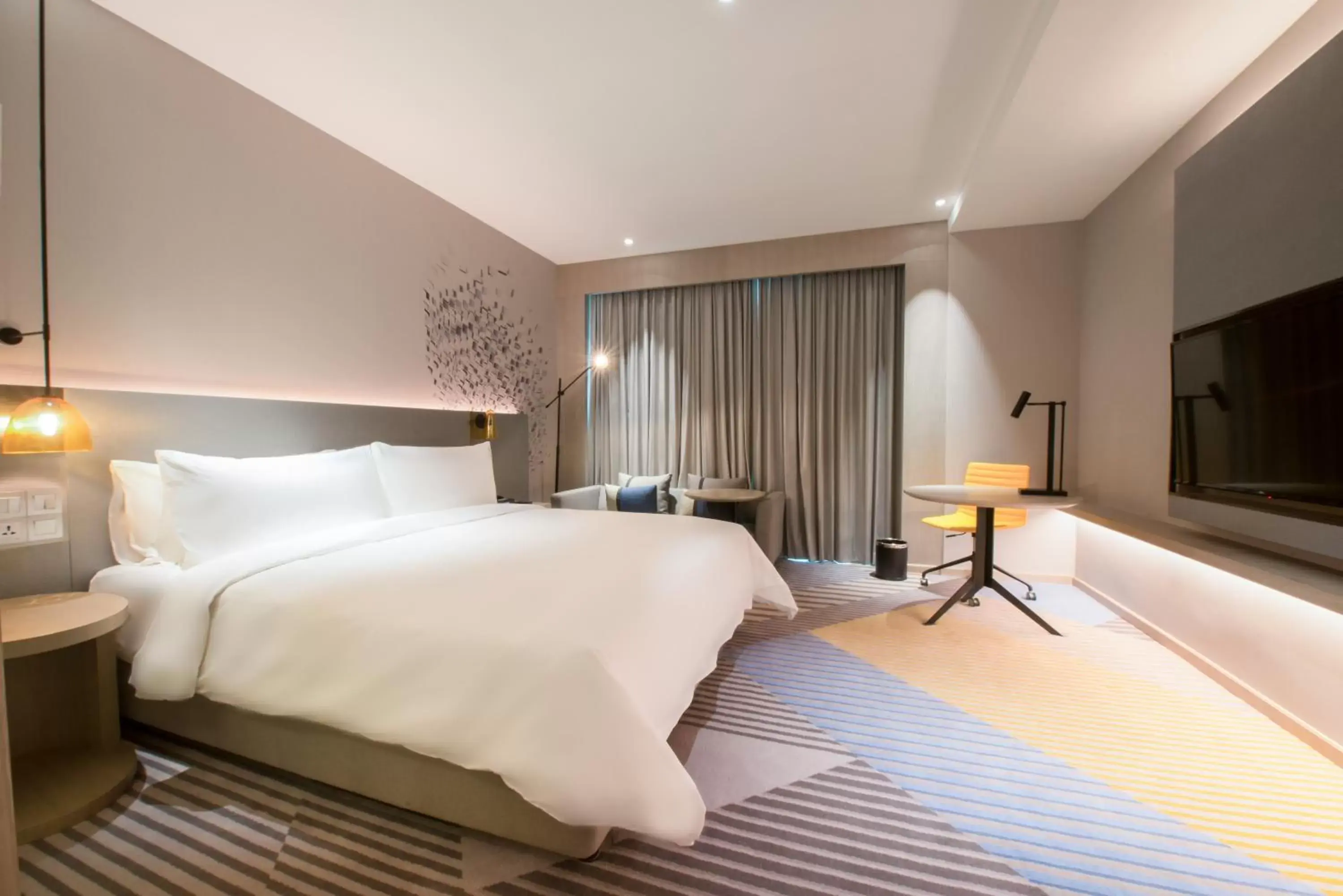 Bed in Holiday Inn Johor Bahru City Centre, an IHG Hotel