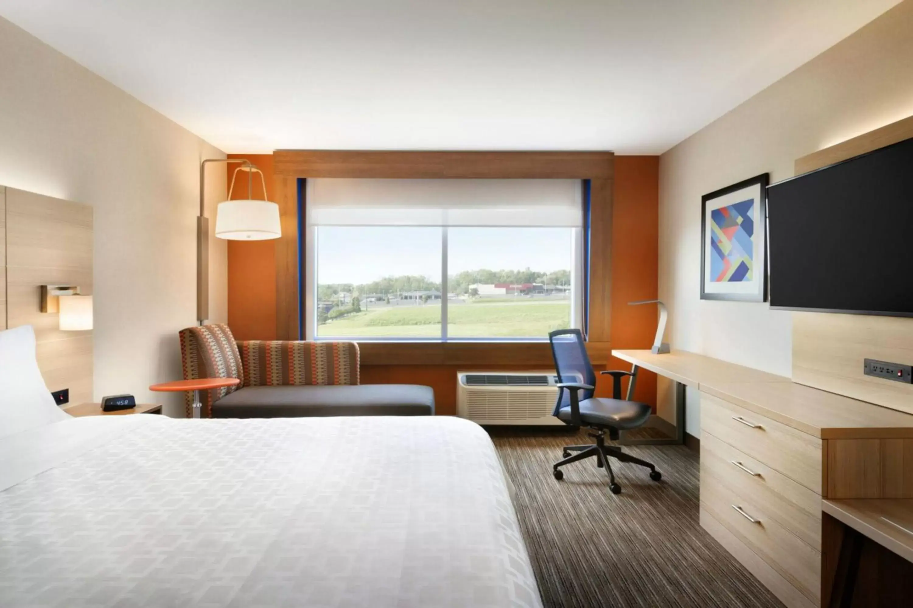 Photo of the whole room, TV/Entertainment Center in Holiday Inn Express & Suites - Fort Wayne North, an IHG Hotel