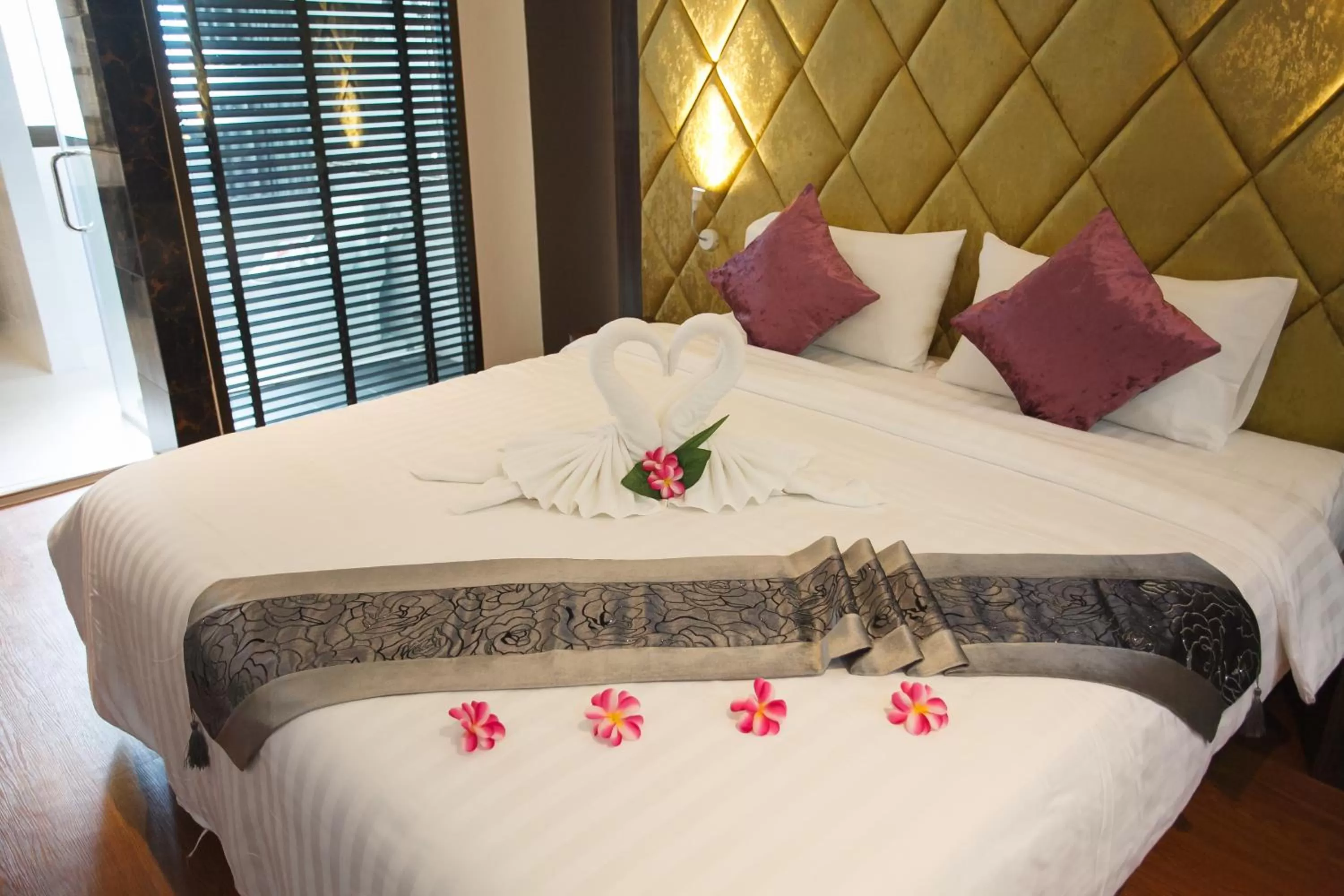 Bed in Grand Pink Hotel Hatyai