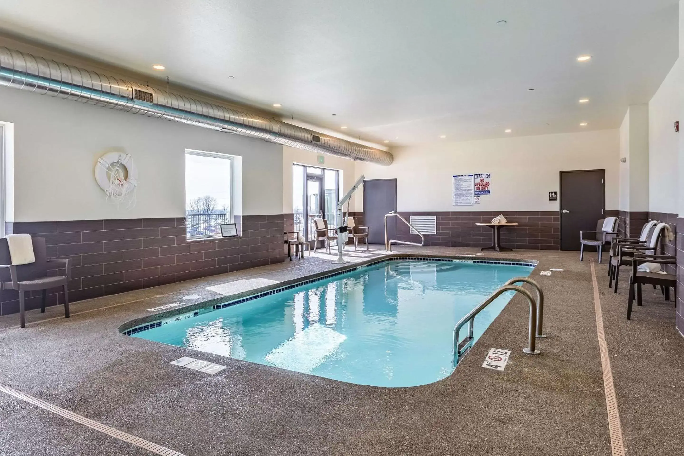 On site, Swimming Pool in Sleep Inn & Suites Mt. Hope near Auction & Event Center