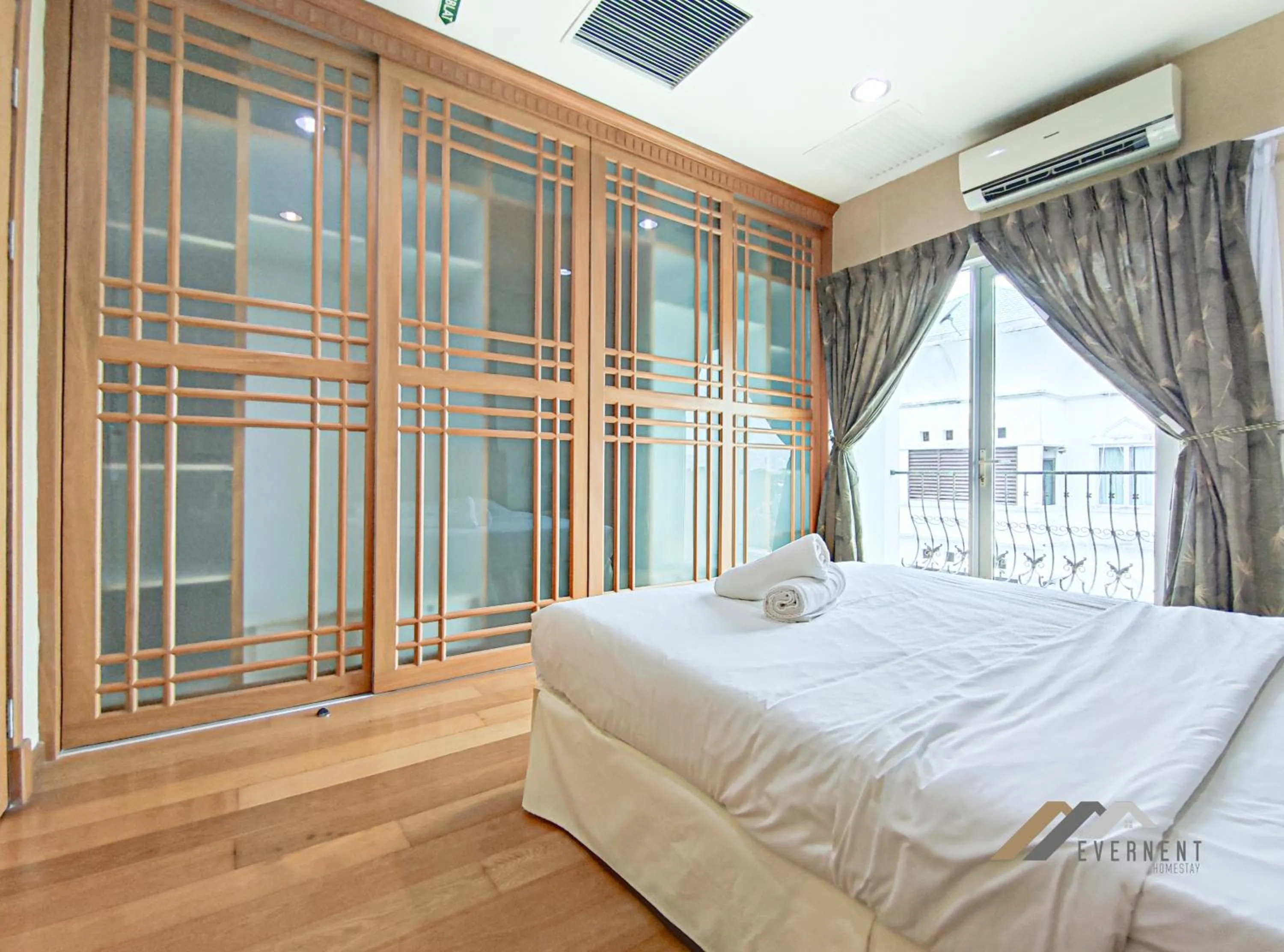 Bed in Mciti Suites by Evernent