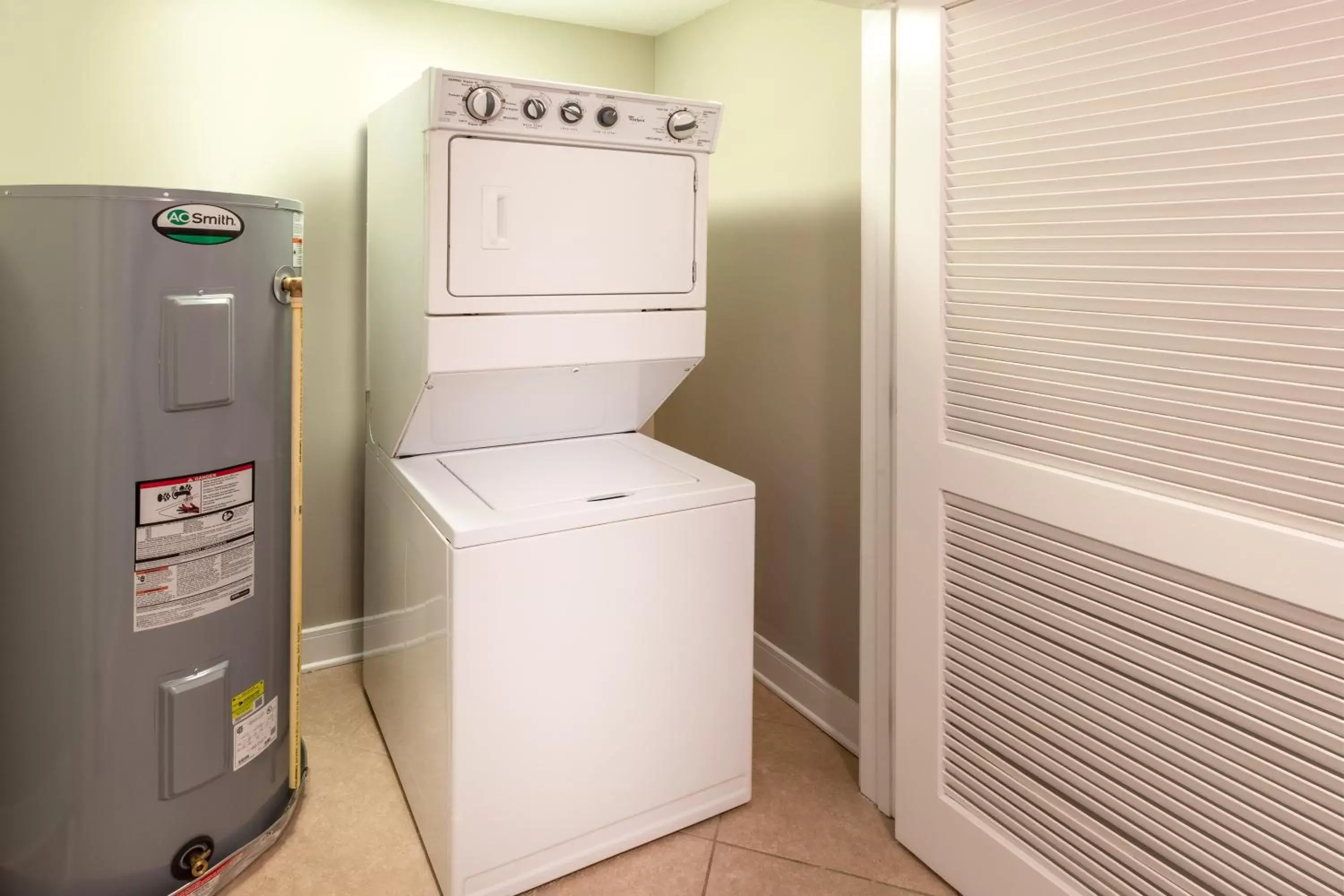 laundry, Kitchen/Kitchenette in Escapes! To The Shores Orange Beach, A Ramada by Wyndham