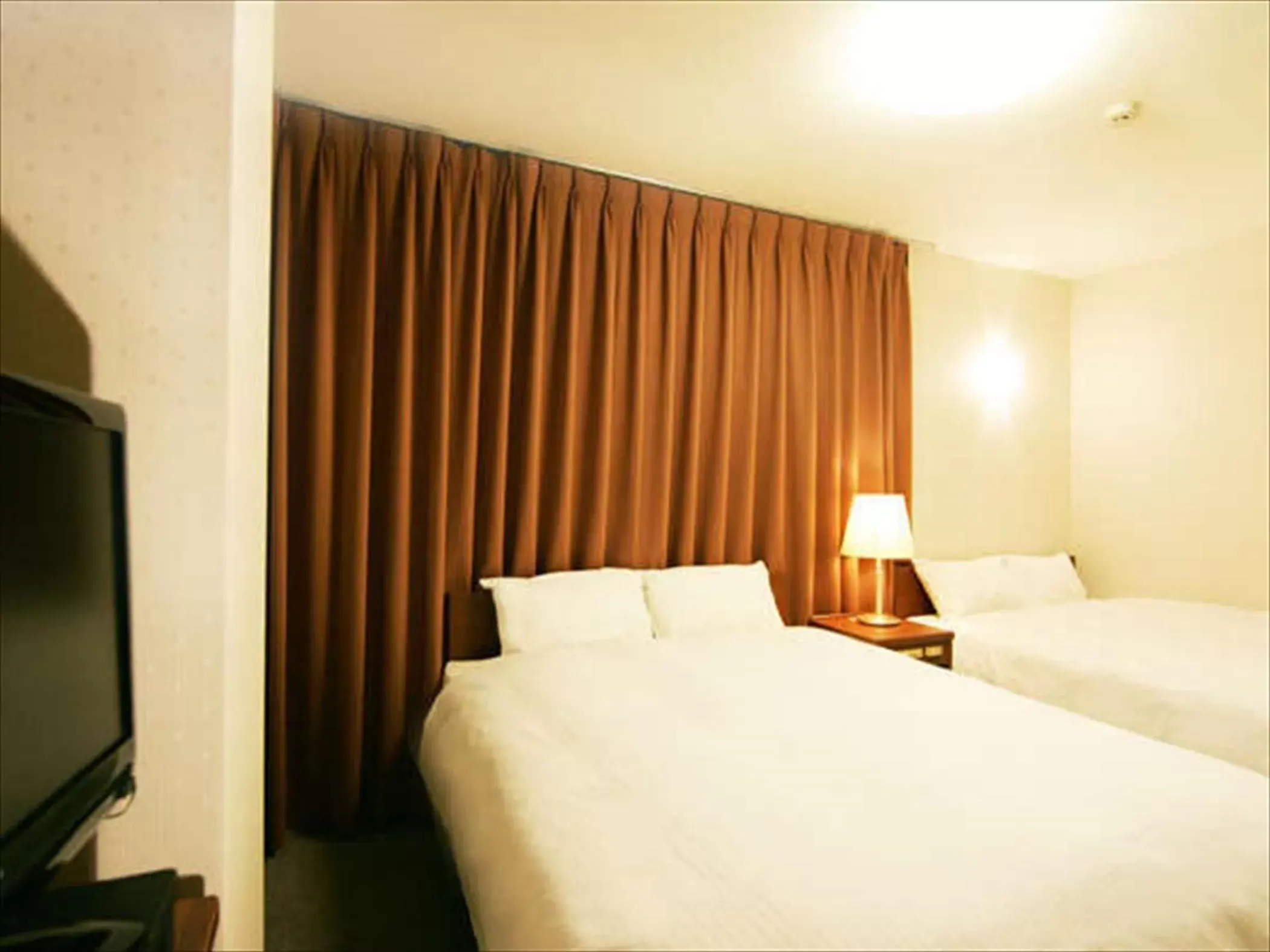Photo of the whole room, Bed in Kochi Green Hotel Harimayabashi