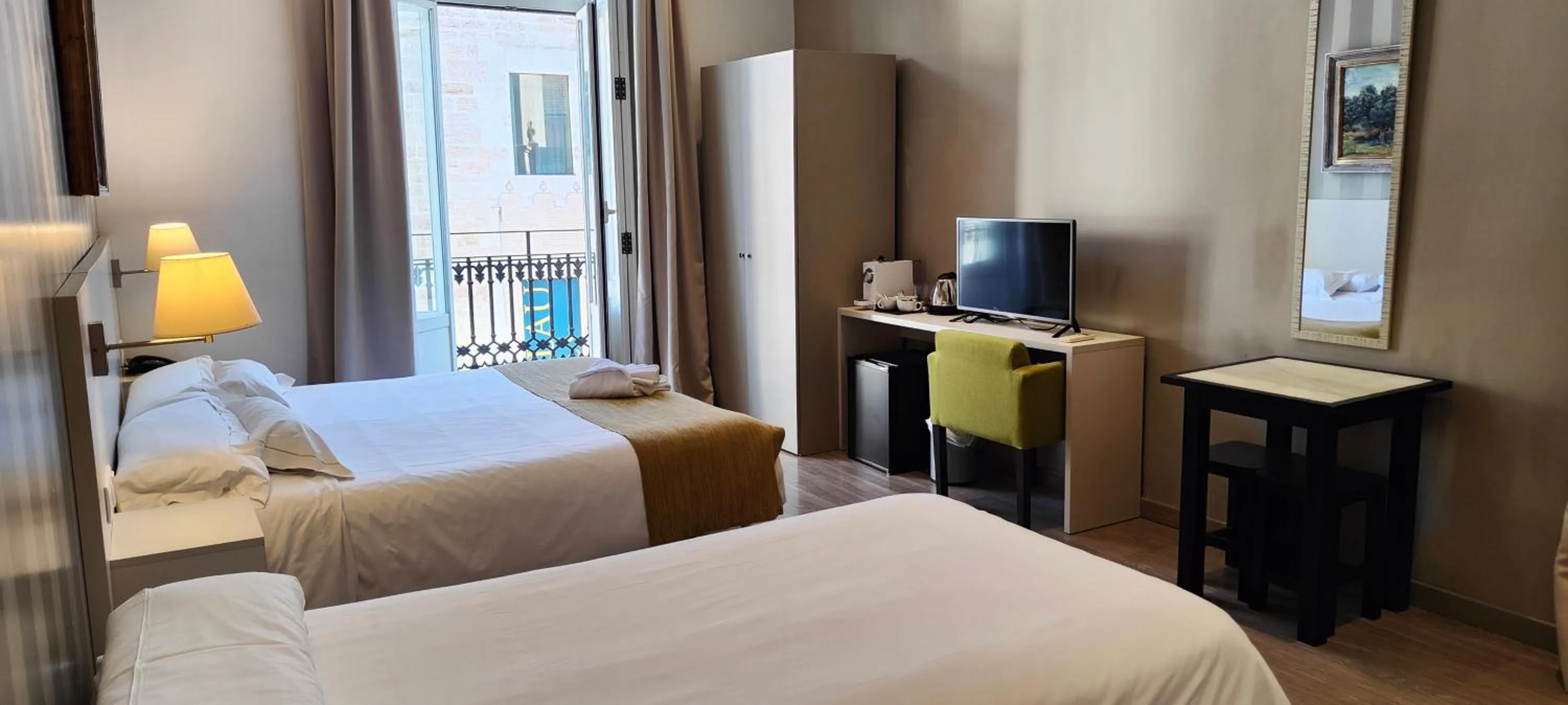 Bed in Hotel San Lorenzo Boutique Plaza