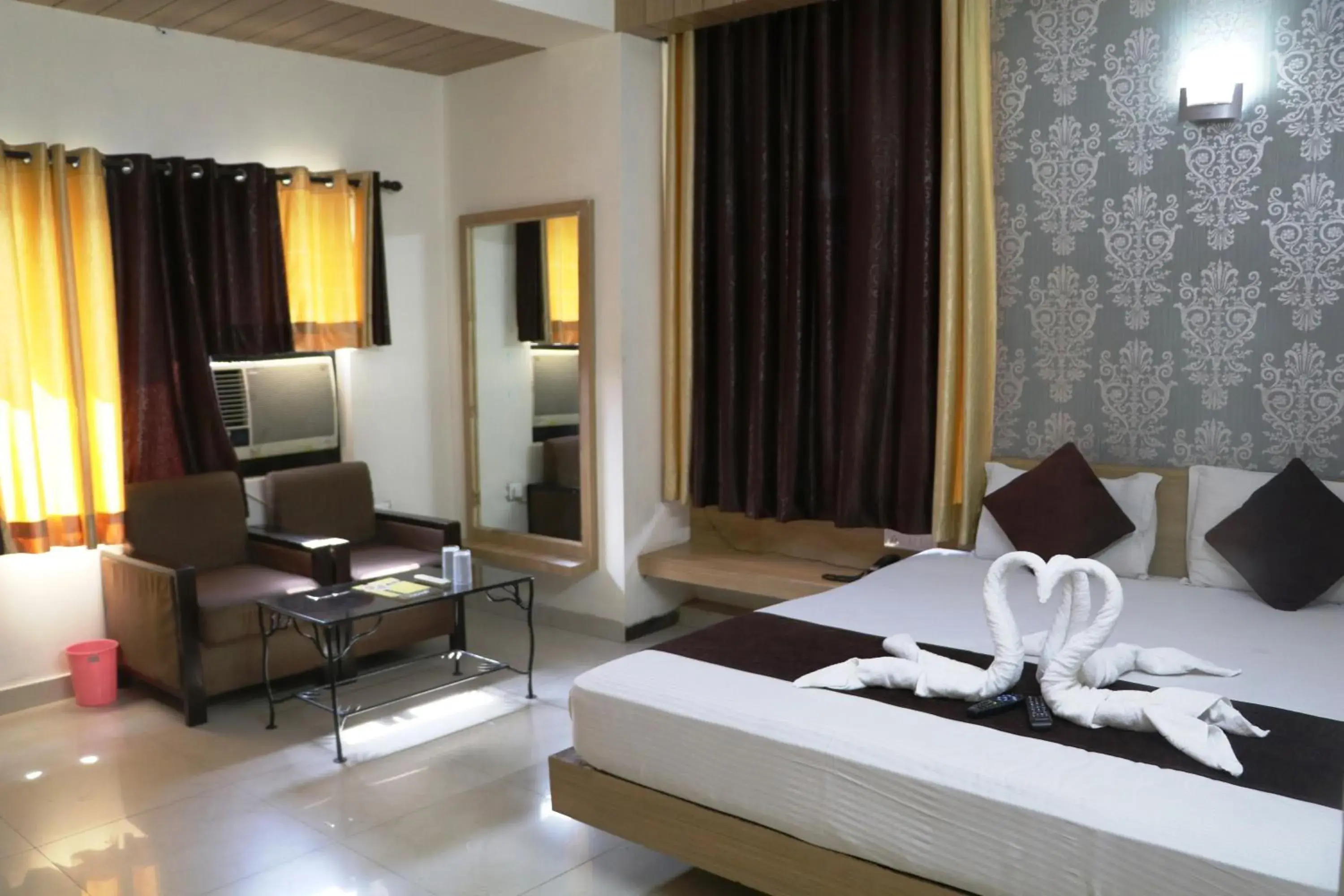 Bed, TV/Entertainment Center in Hotel Vaishnavi
