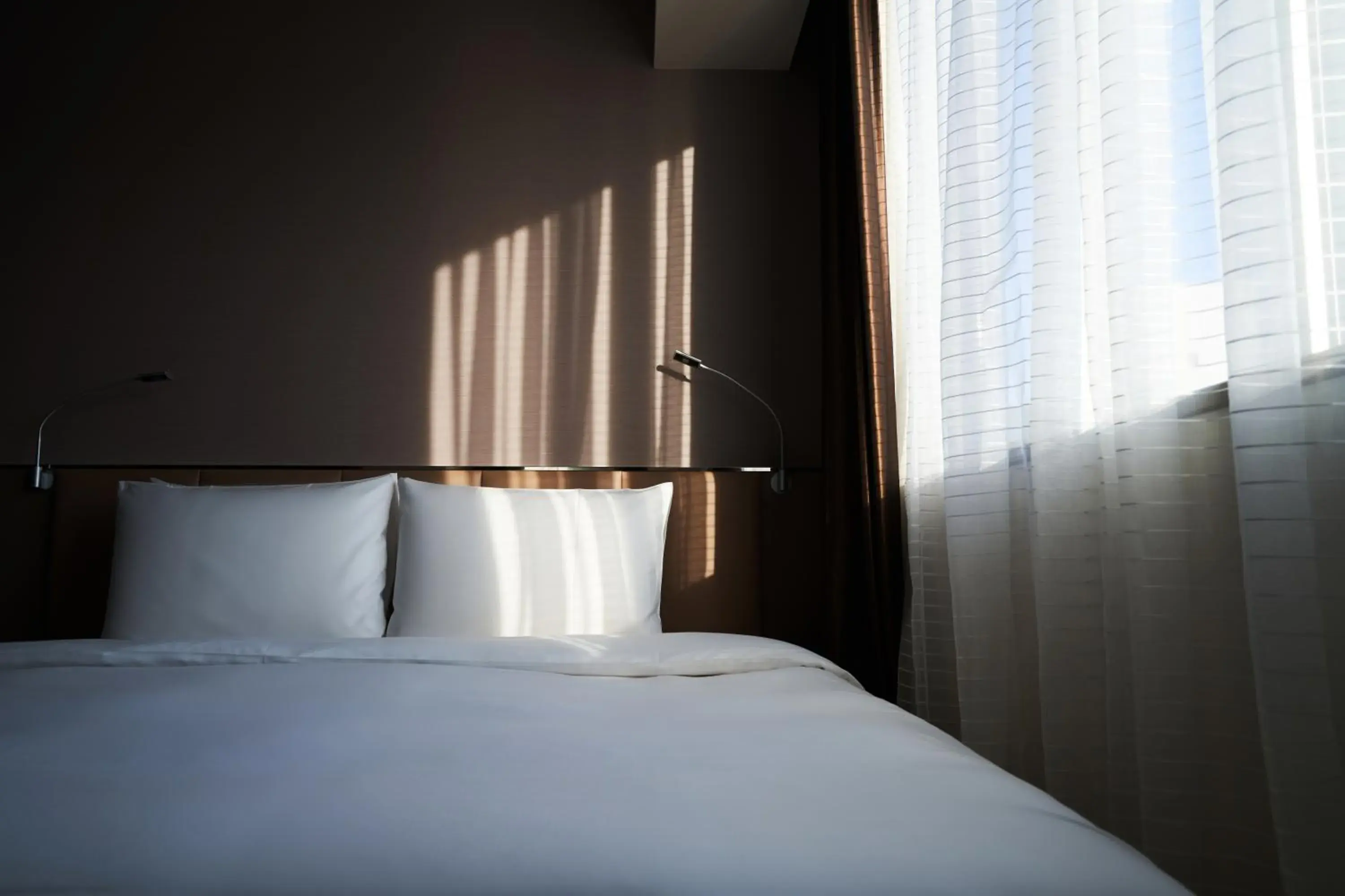 Bed in Holiday Inn & Suites Shin Osaka, an IHG Hotel