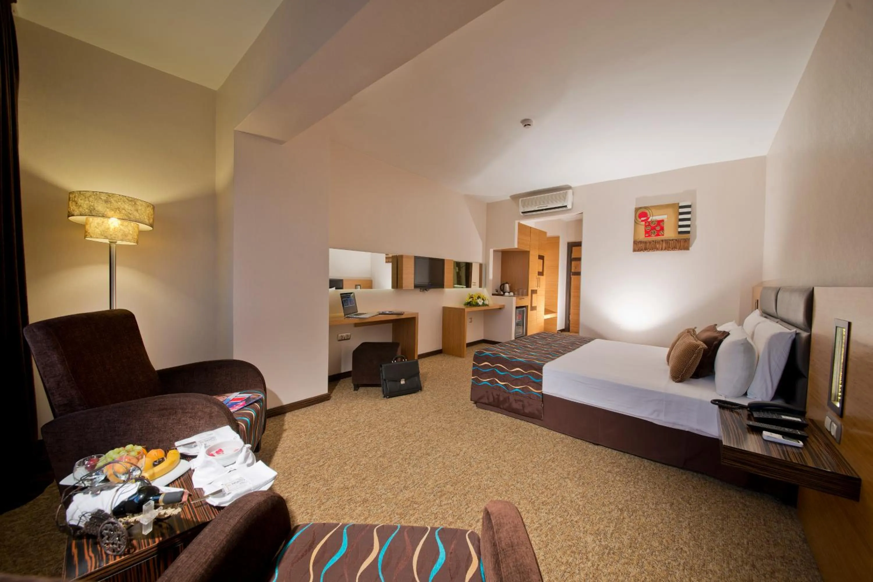 Seating area, Bed in North Point Hotel