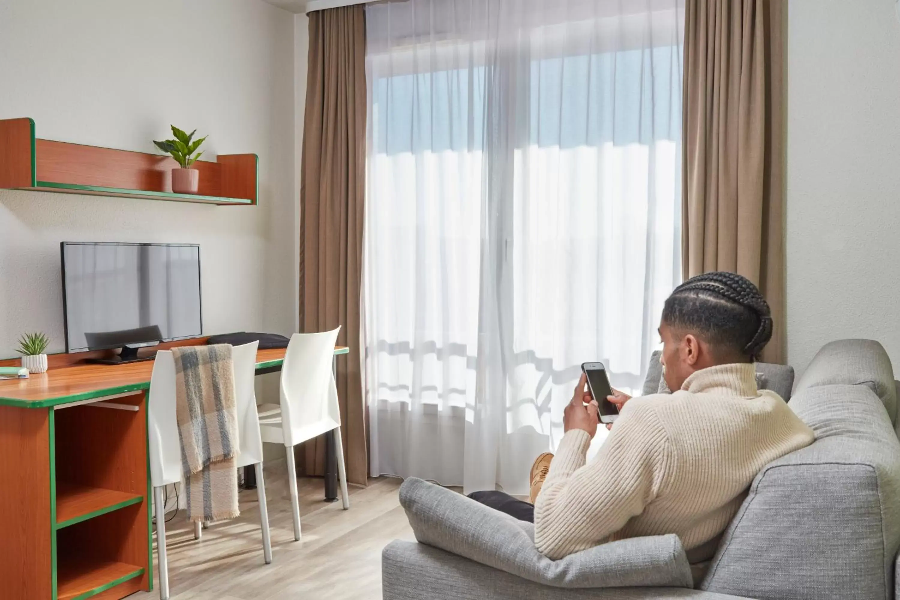 Living room in Aparthotel Adagio Access Bordeaux Rodesse