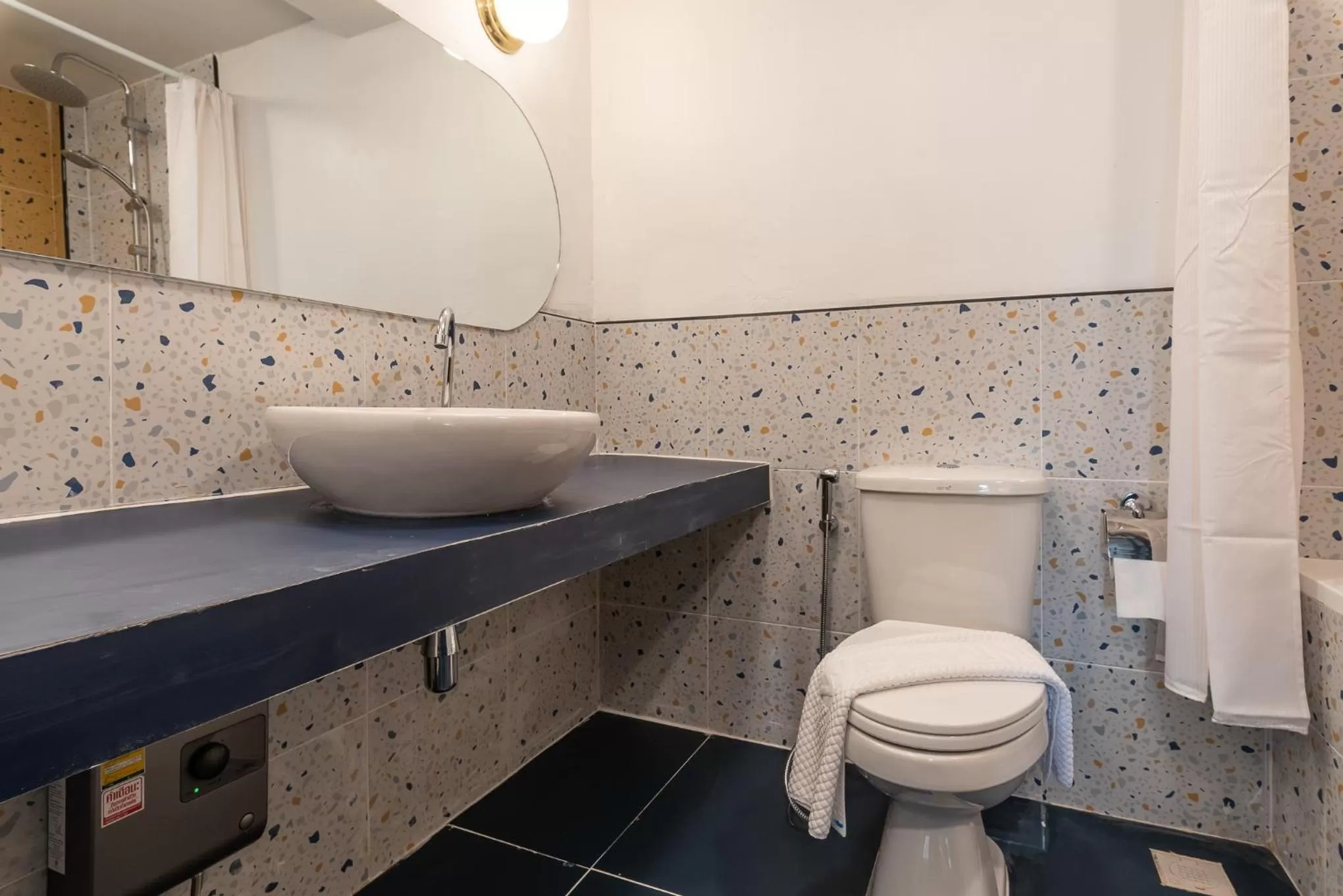 Toilet in The Mellow Pillow Hotel @ Chiang Mai Gate