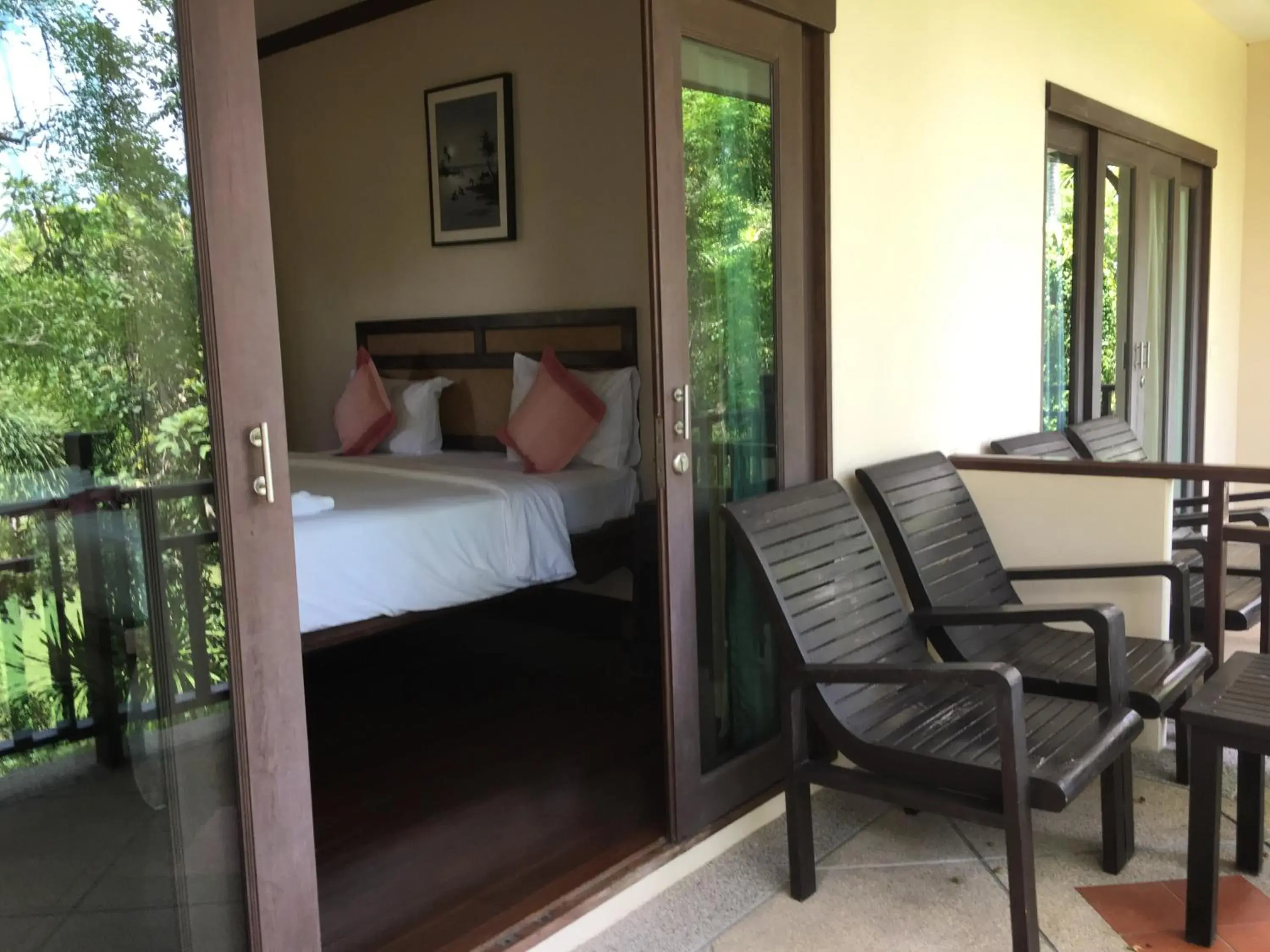 Balcony/Terrace, Bed in Grand Manita Beach Resort