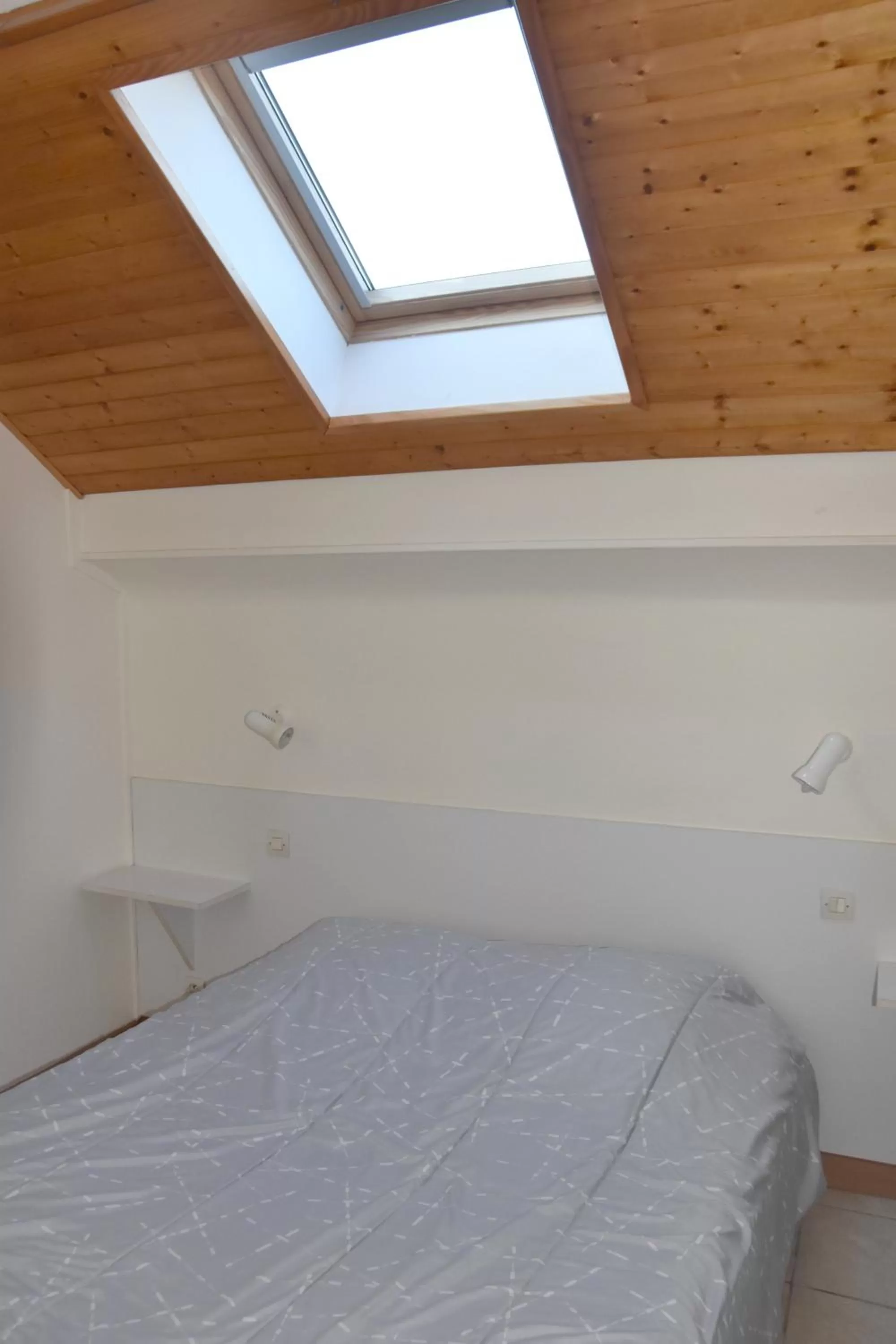 Bed in Hotel Gai Relais