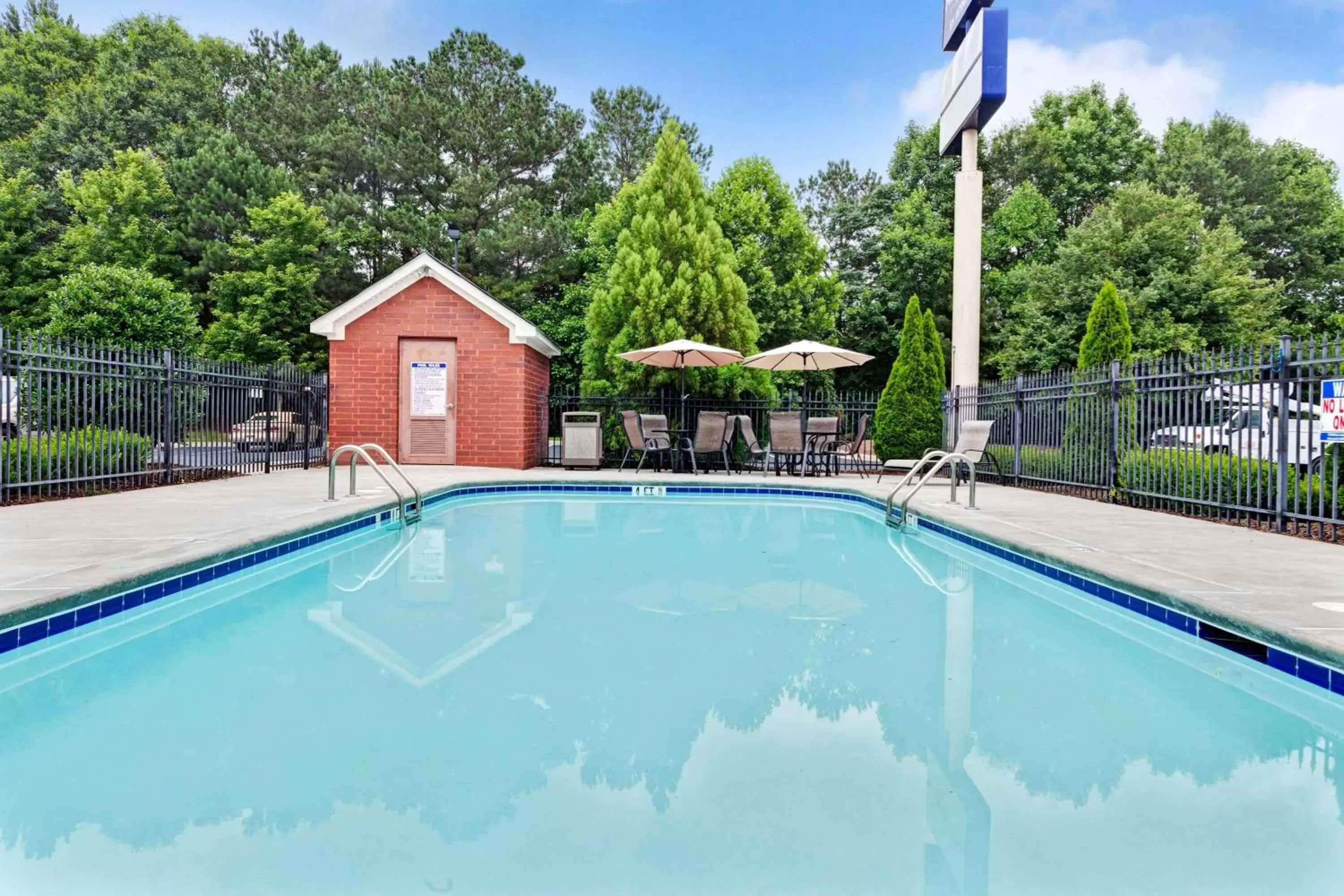 On site, Swimming Pool in Microtel Inn & Suites by Wyndham Woodstock/Atlanta North