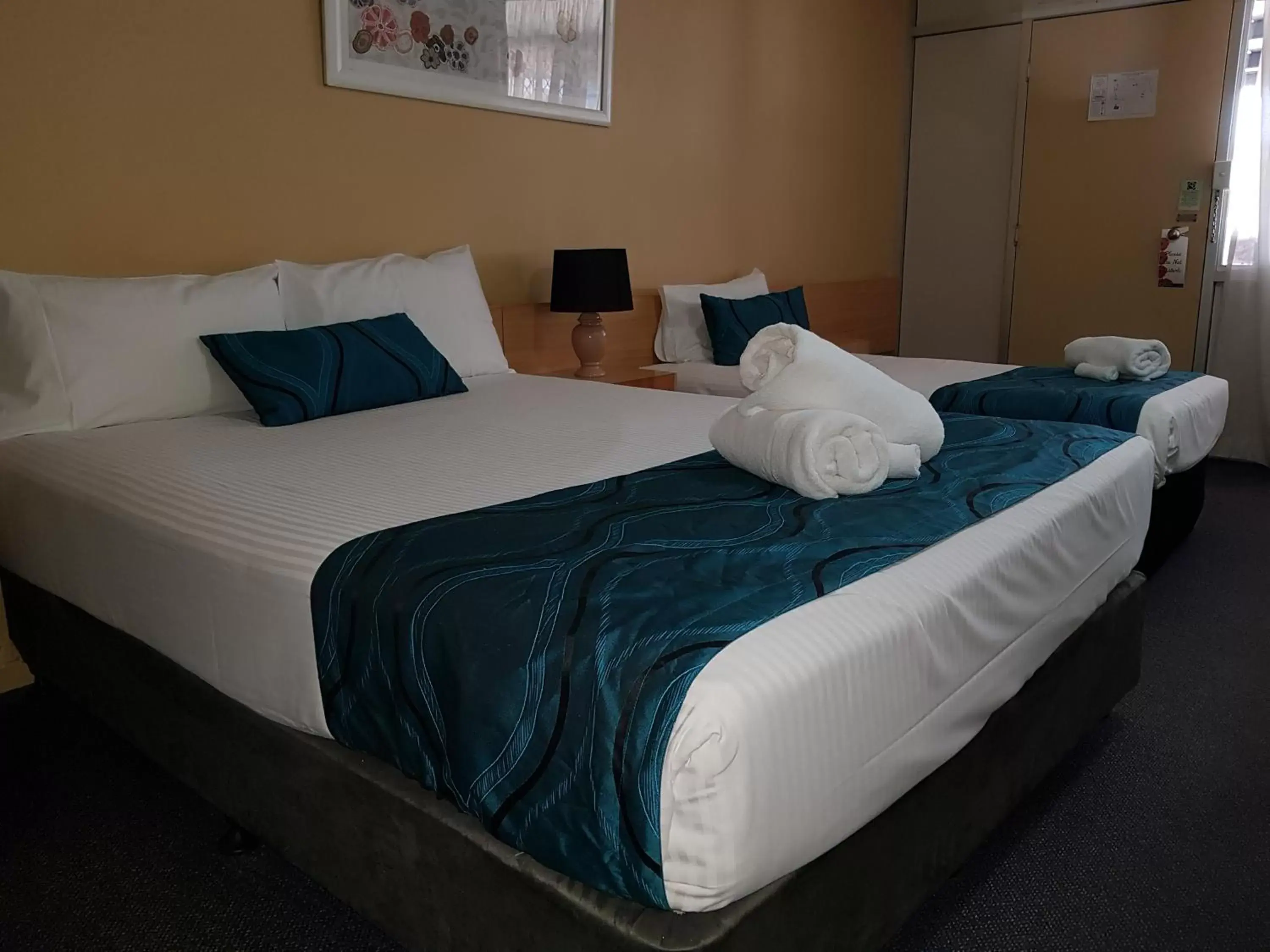 Bed in The Q Motel Rockhampton