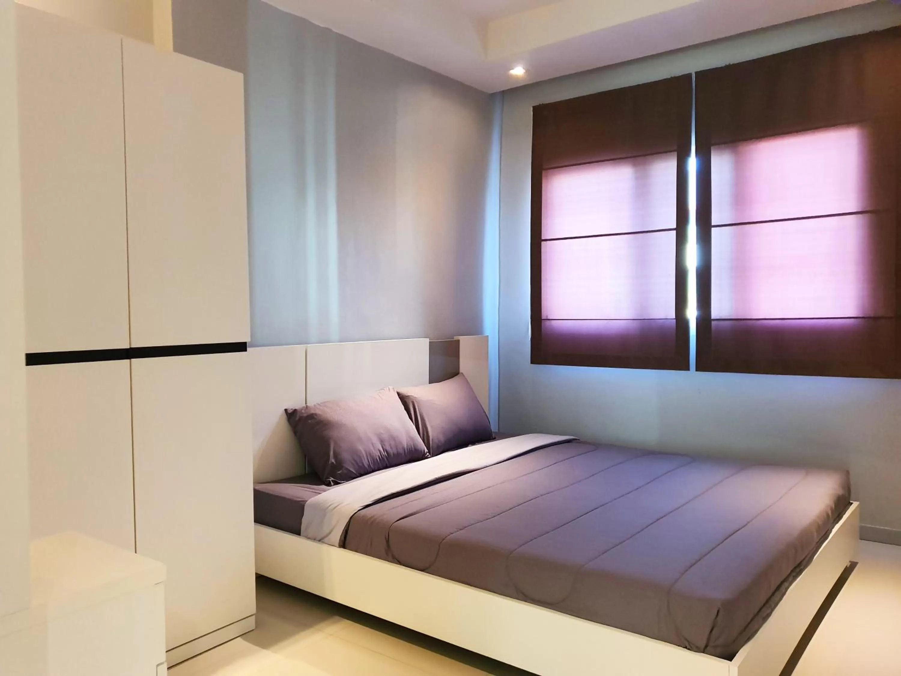 Bed in The Sriracha Residence