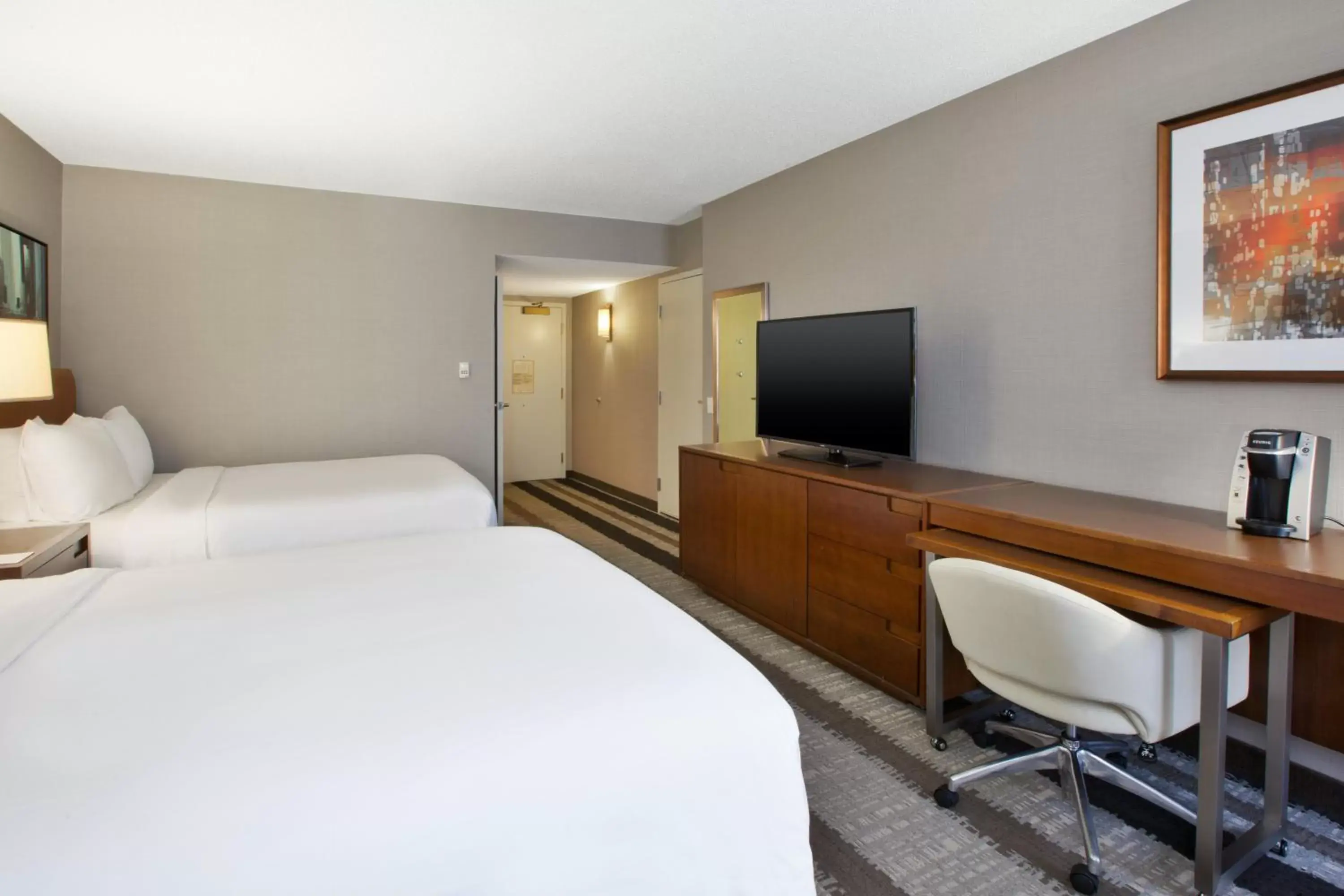 Photo of the whole room, TV/Entertainment Center in Crowne Plaza Dulles Airport, an IHG Hotel