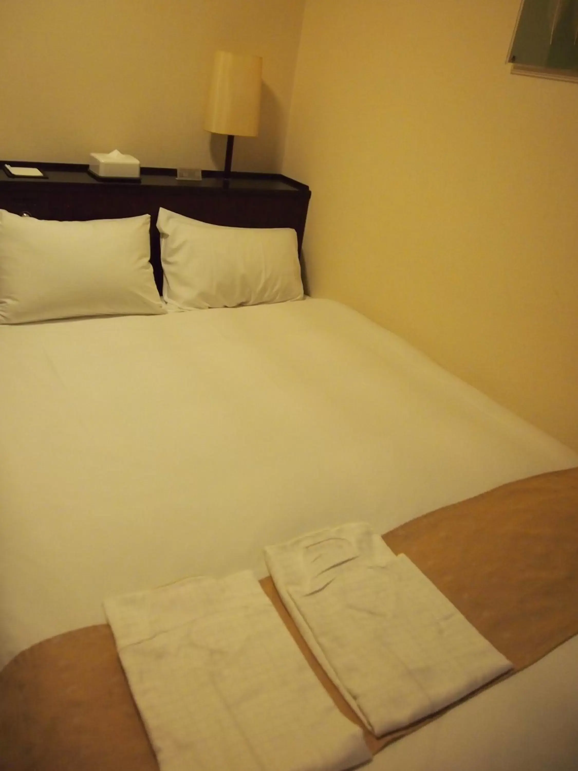 Bed in Nest Hotel Kumamoto