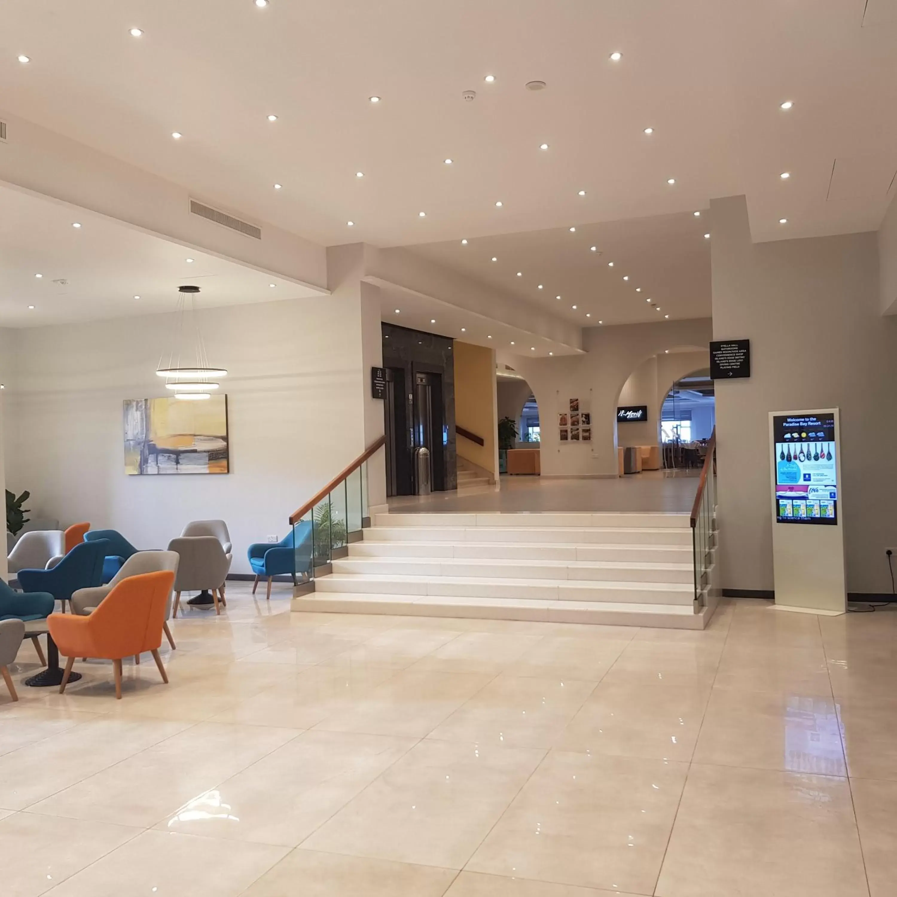 Seating area, Lobby/Reception in Paradise Bay Resort