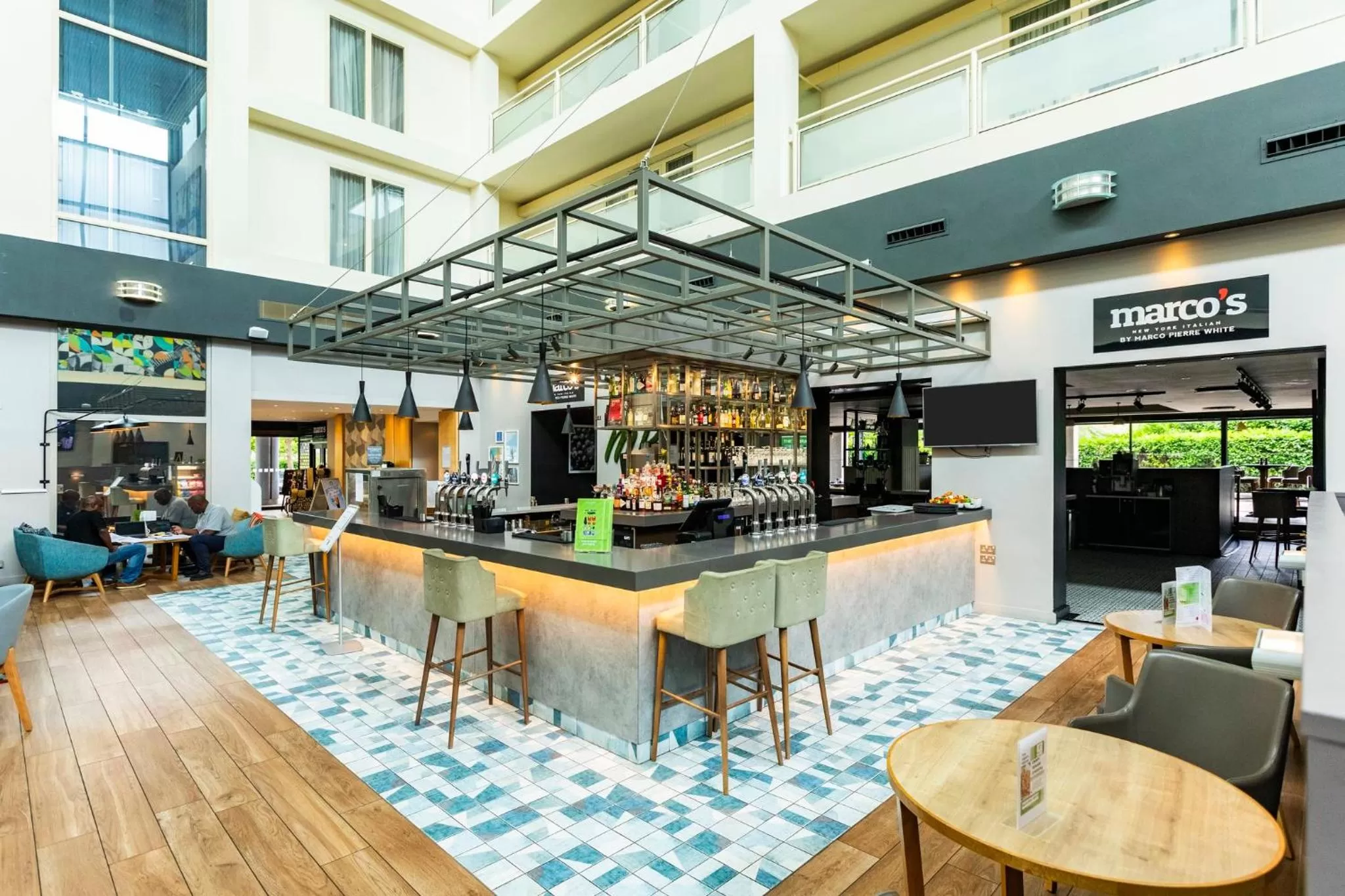 Lounge or bar in Holiday Inn Milton Keynes Central by IHG