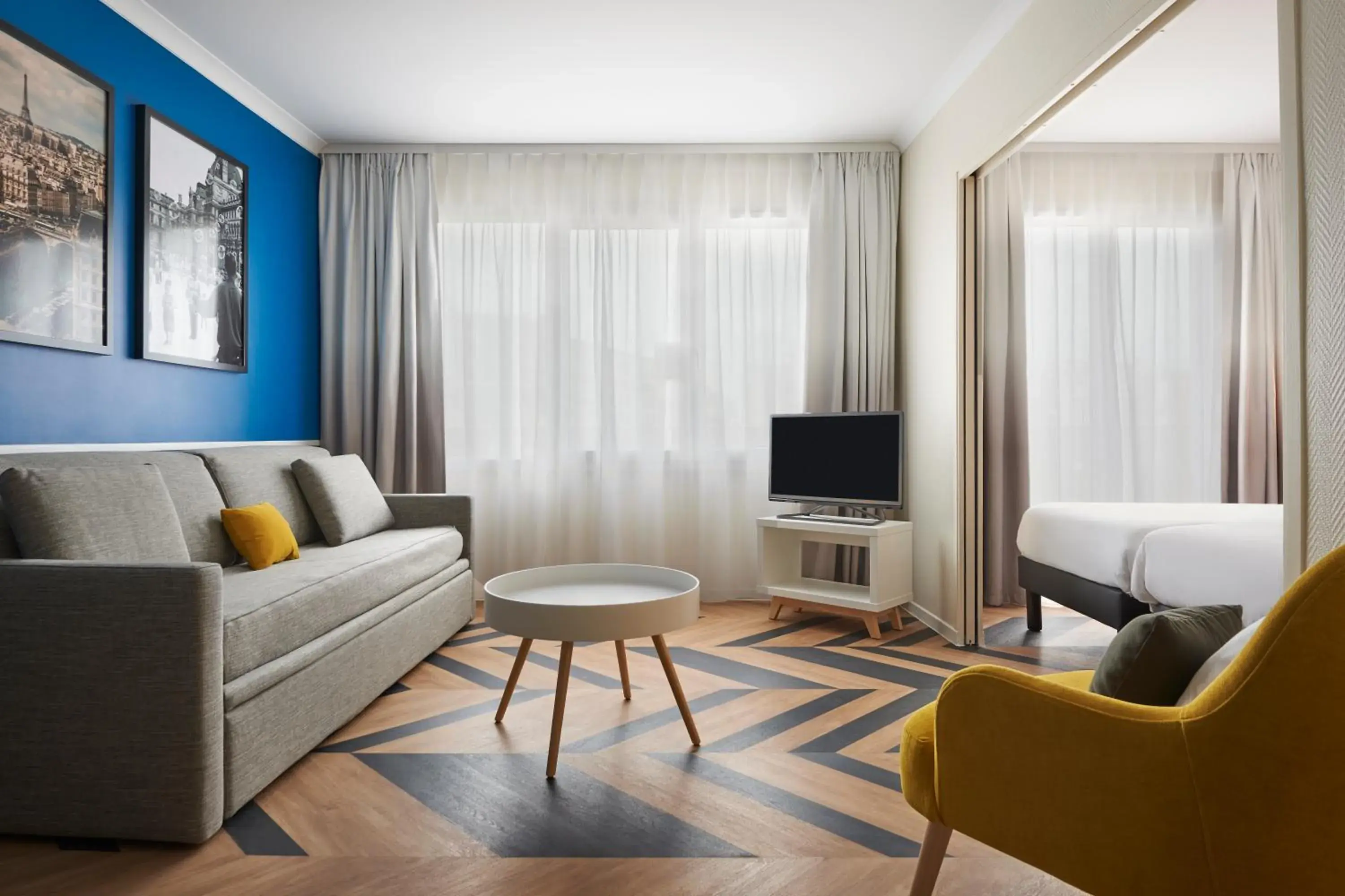 Living room, Seating Area in Aparthotel Adagio Porte de Versailles