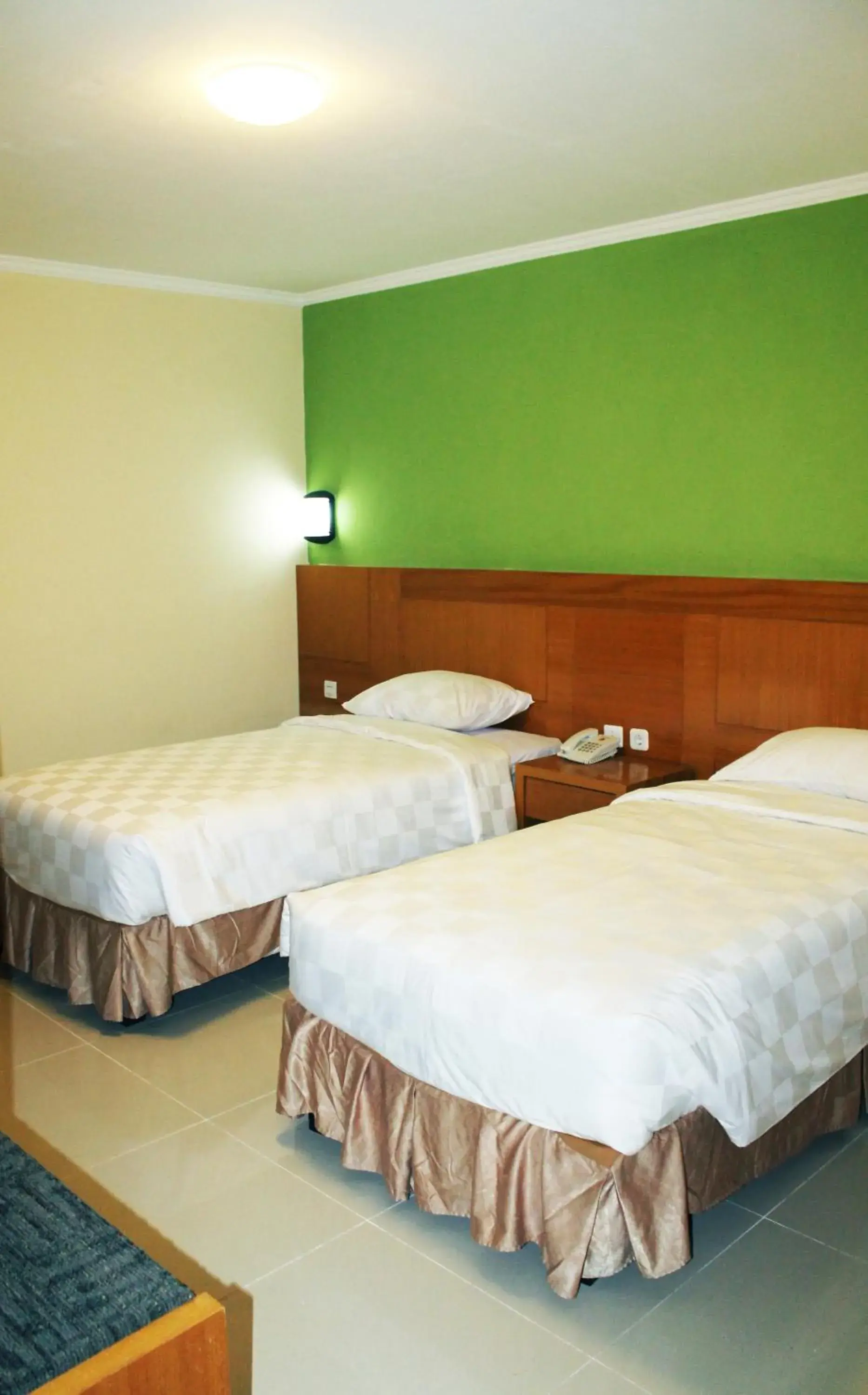 Bed in Maleosan Inn Manado