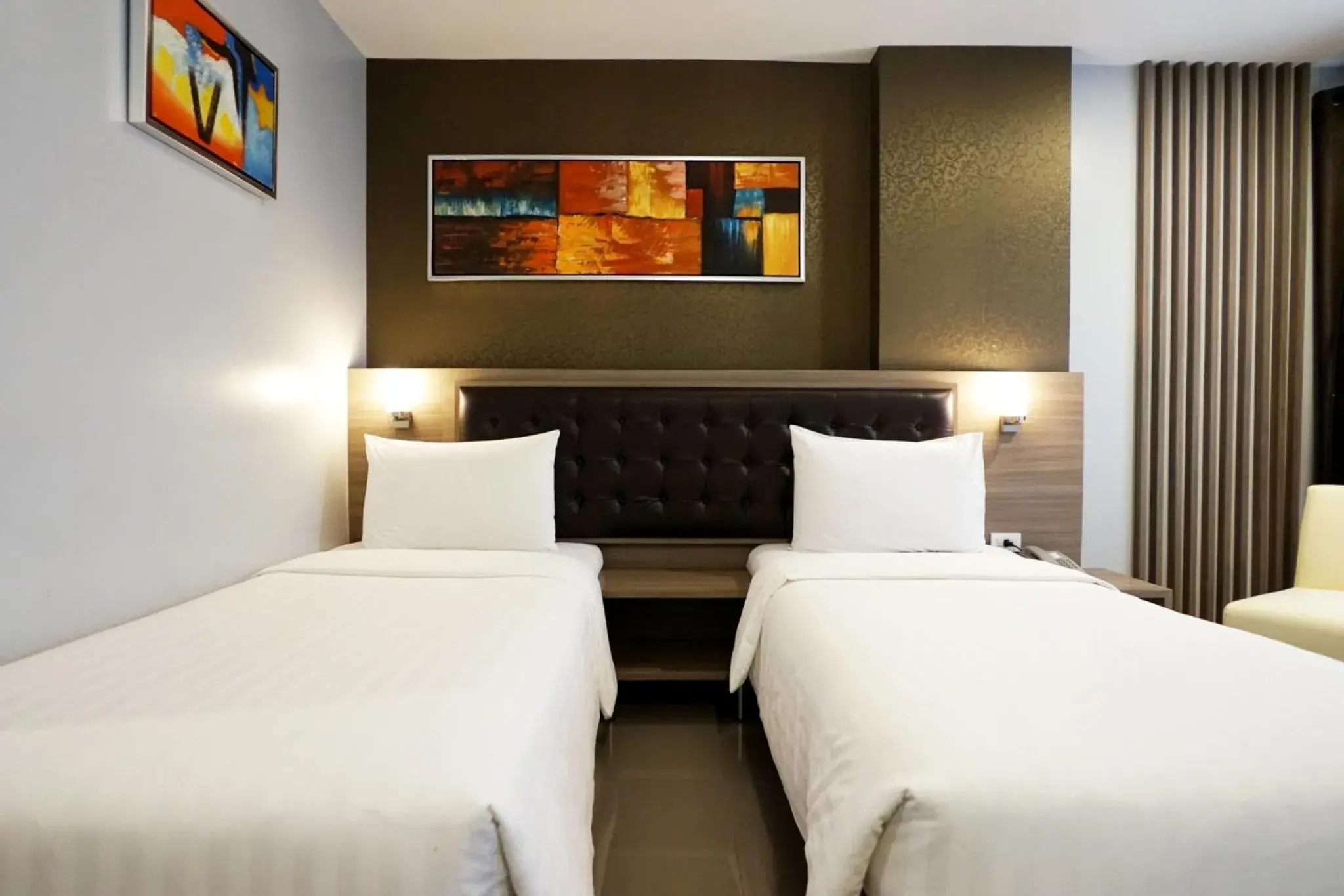 Bed in Picnic Hotel Bangkok