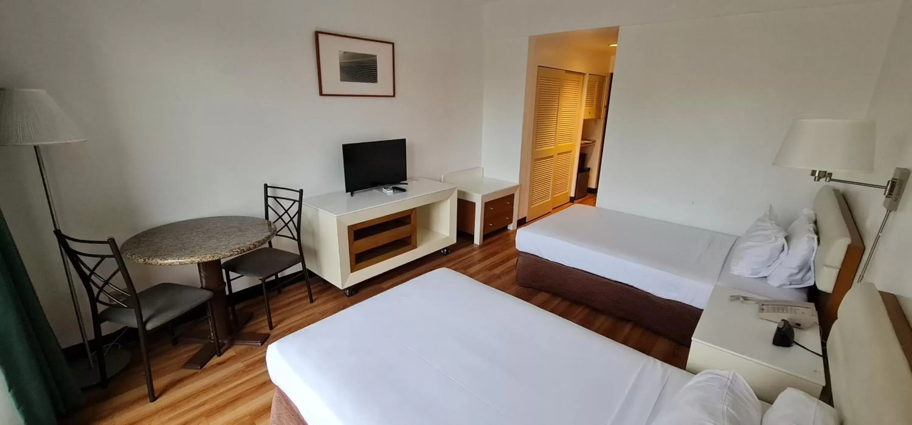 Bed in SureStay Hotel by Best Western Guam Palmridge