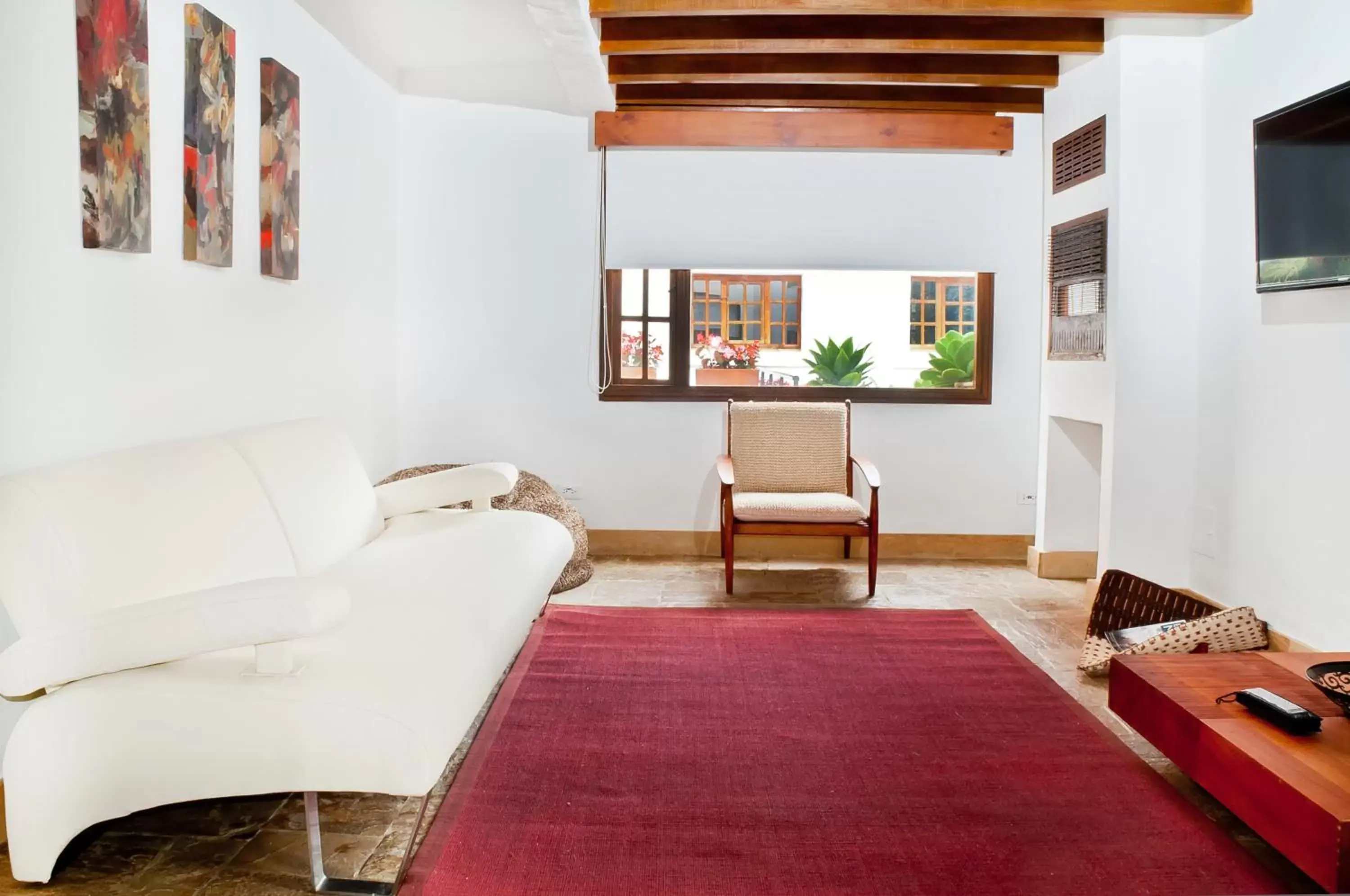 Communal lounge/ TV room, Seating Area in Hotel Casona Usaquen