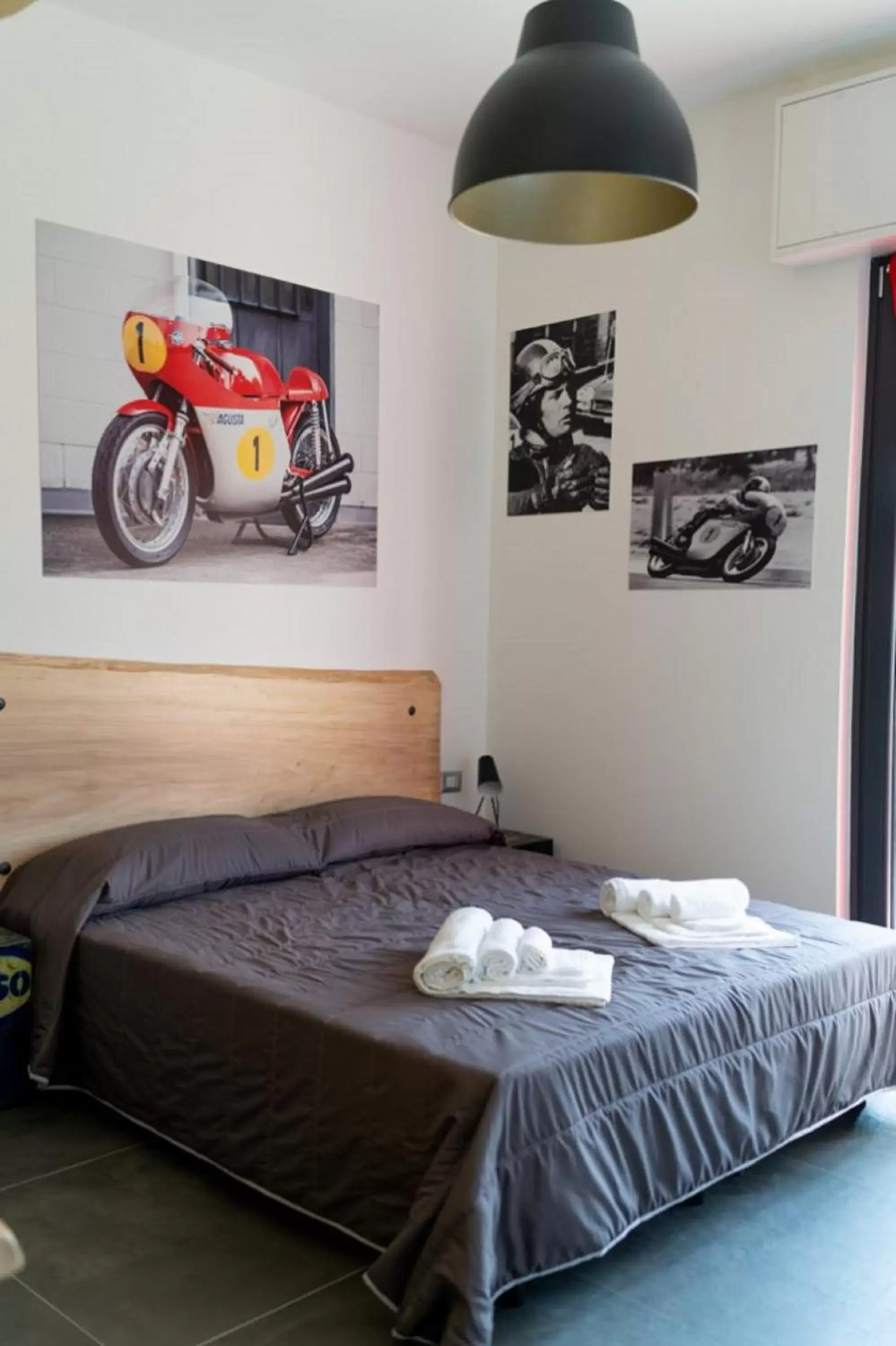 Photo of the whole room, Bed in Italian Piston House Sport Moto Rent