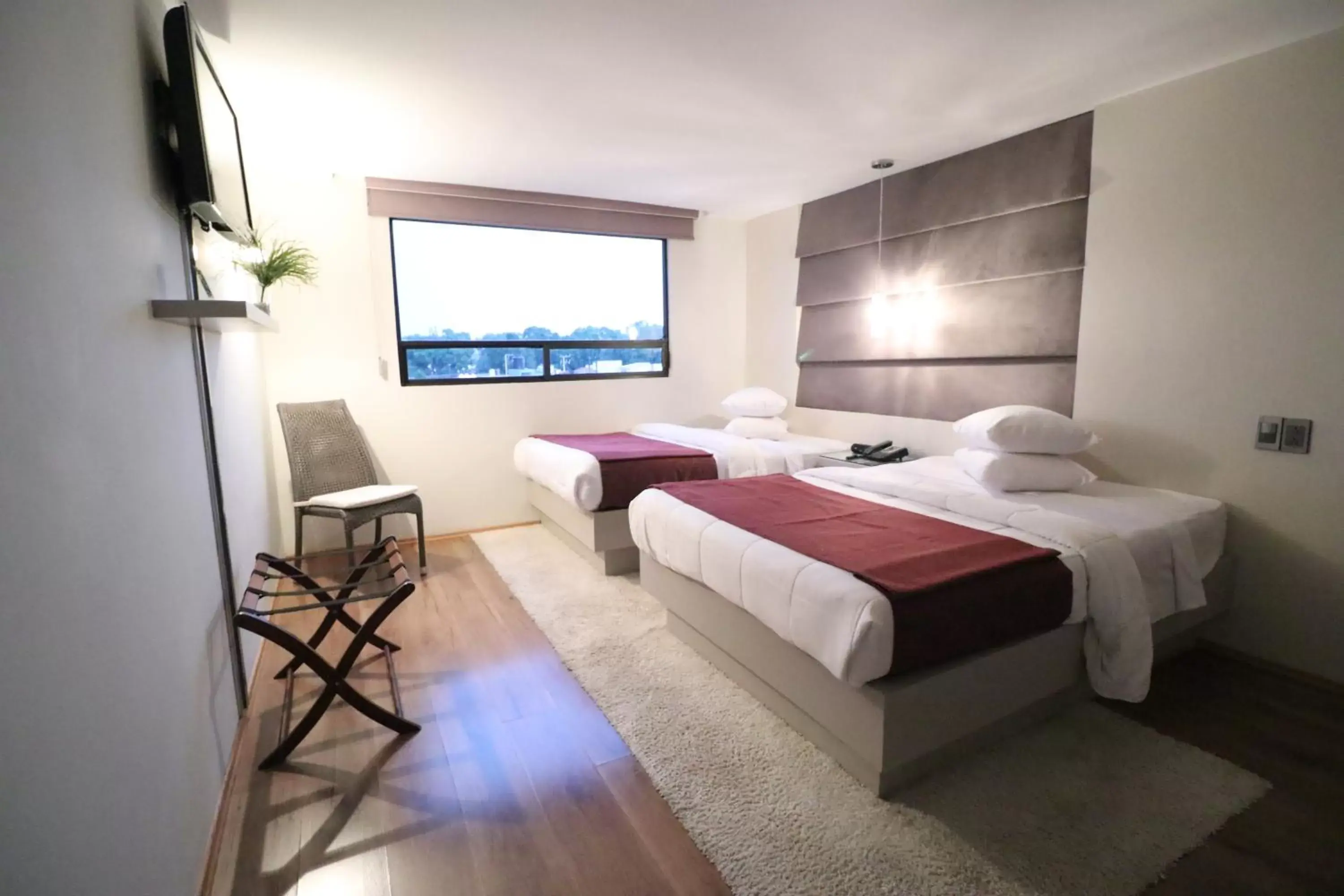Bed in Hotel Posada Tulancingo