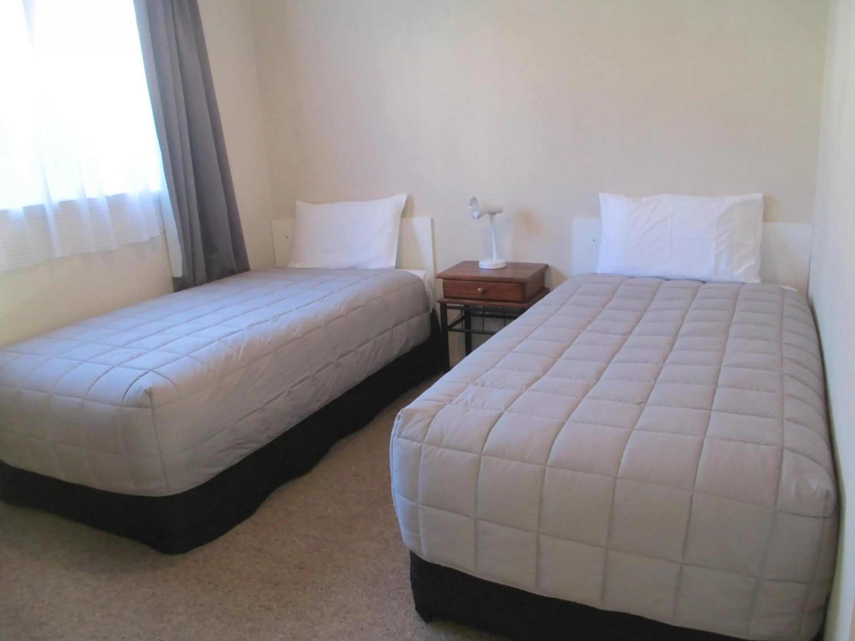 Bed in Merivale Court Motel & Apartments