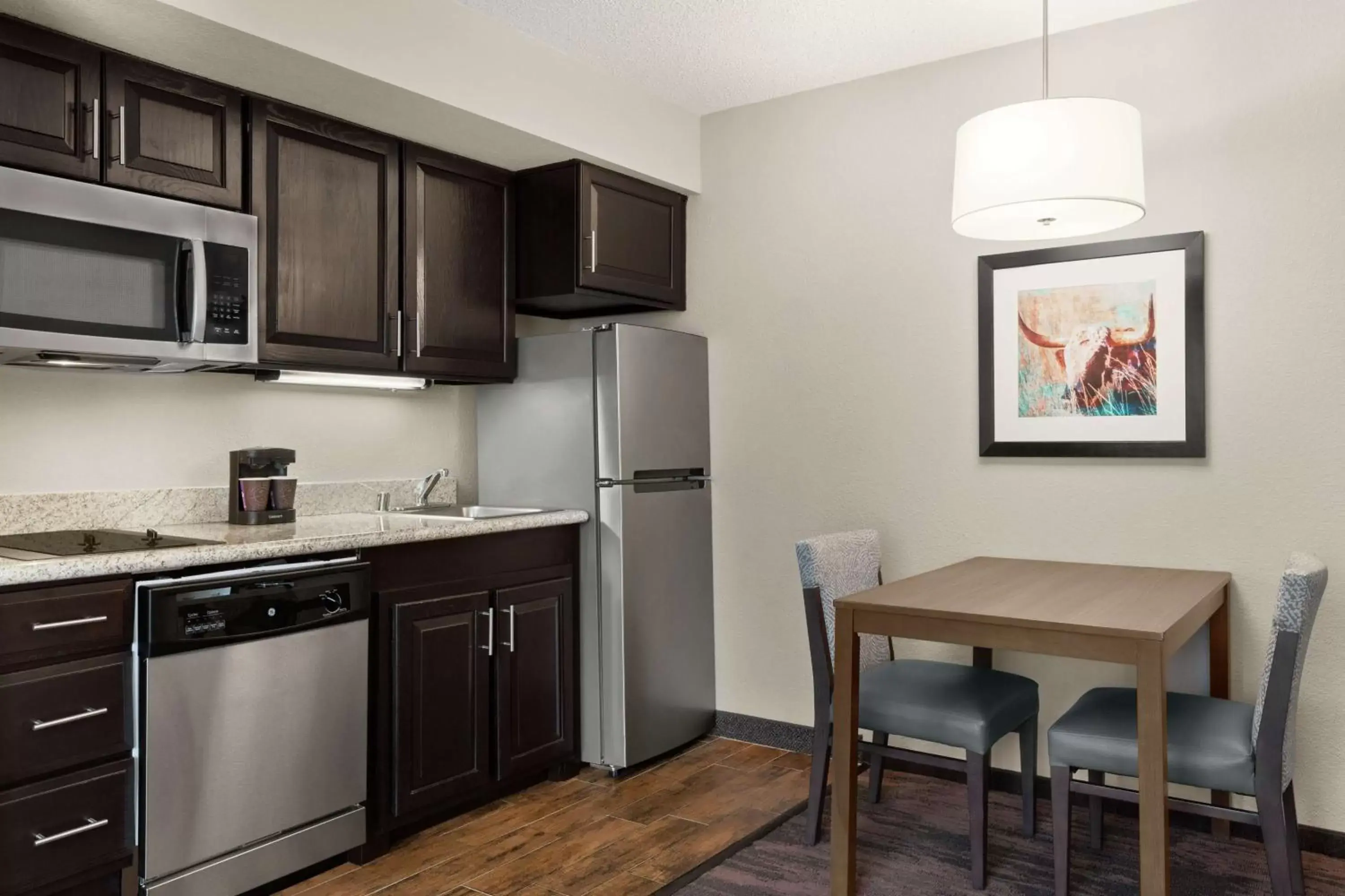 Bedroom, Kitchen/Kitchenette in Homewood Suites Dallas-Addison