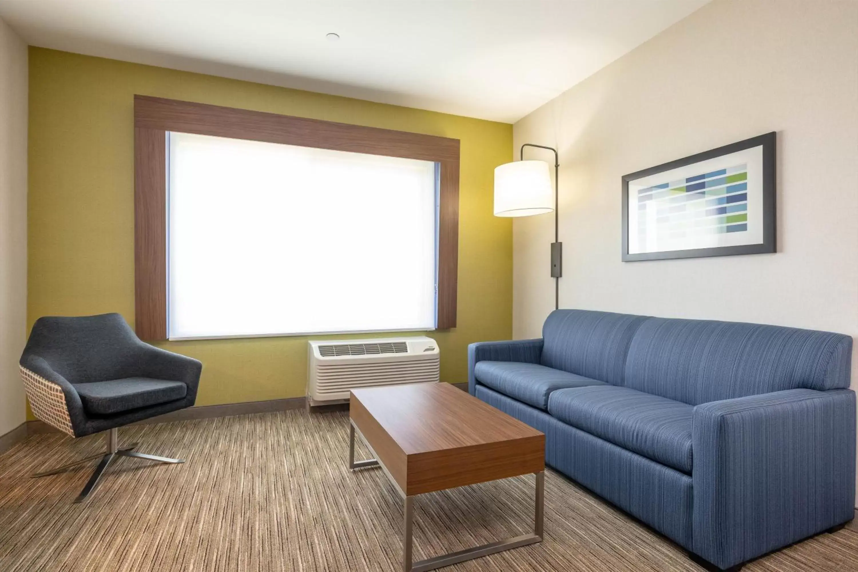 Bedroom, Seating Area in Holiday Inn Express & Suites - San Jose Silicon Valley, an IHG Hotel