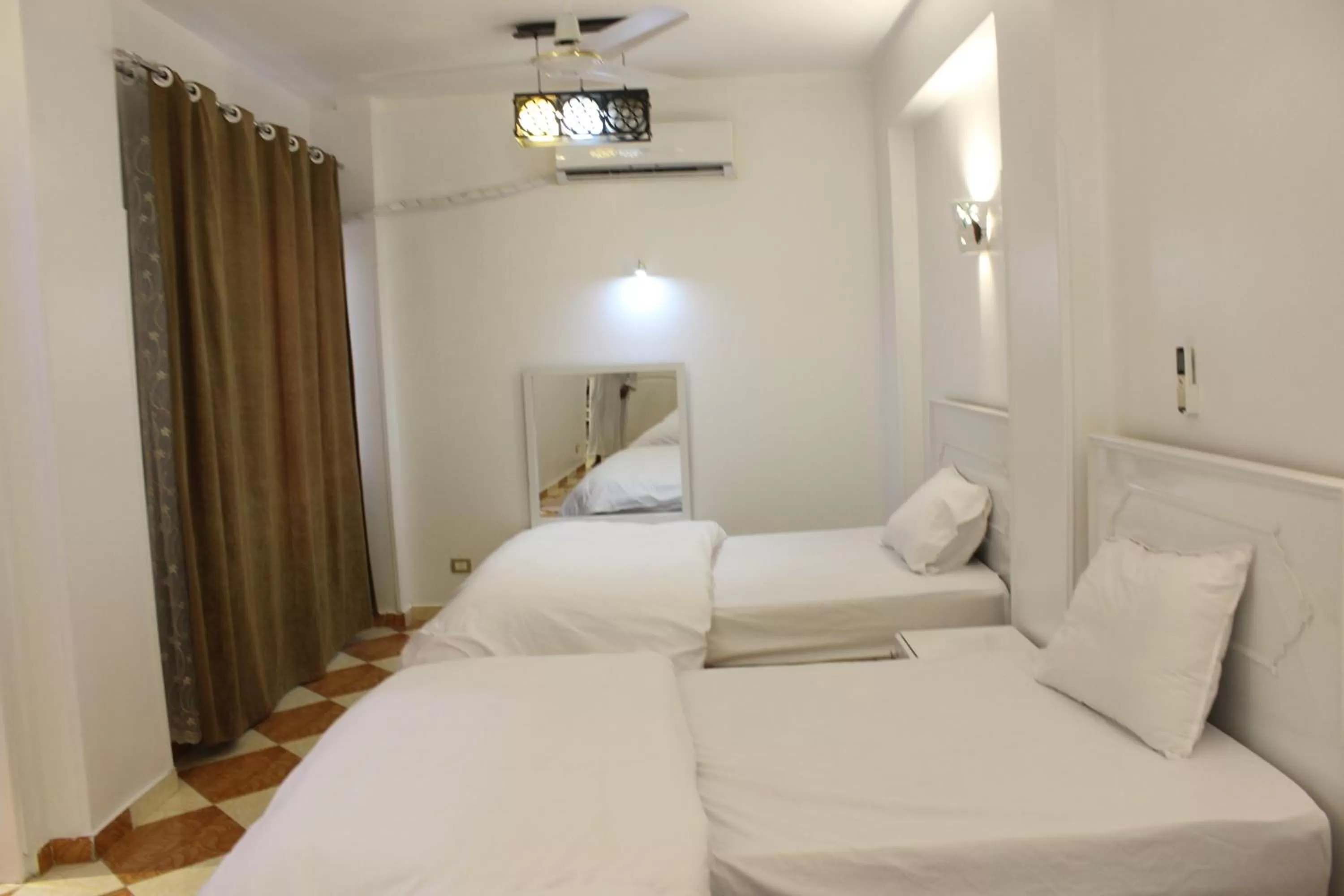 Bed in Mama Africa Apts & Studios