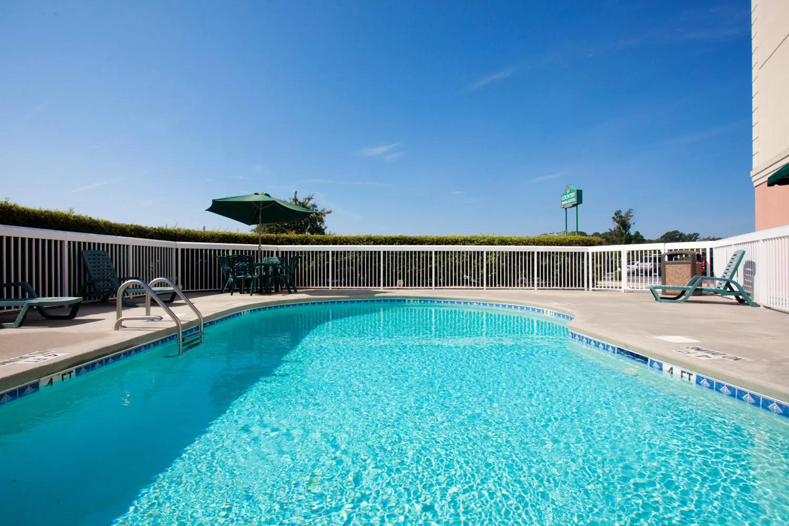 Swimming pool in Country Inn & Suites by Radisson, Goldsboro, NC