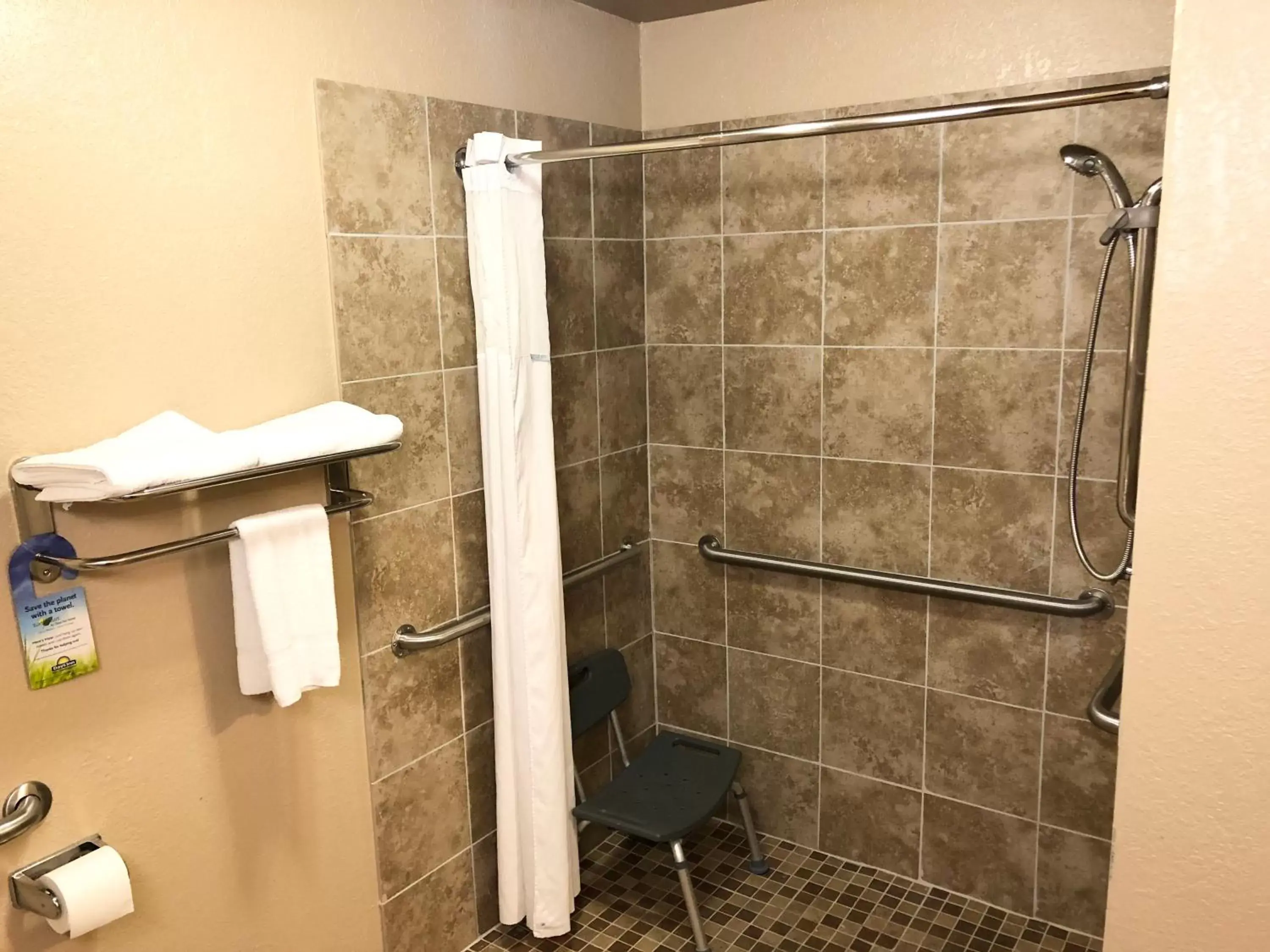 Bathroom in Days Inn by Wyndham West Des Moines