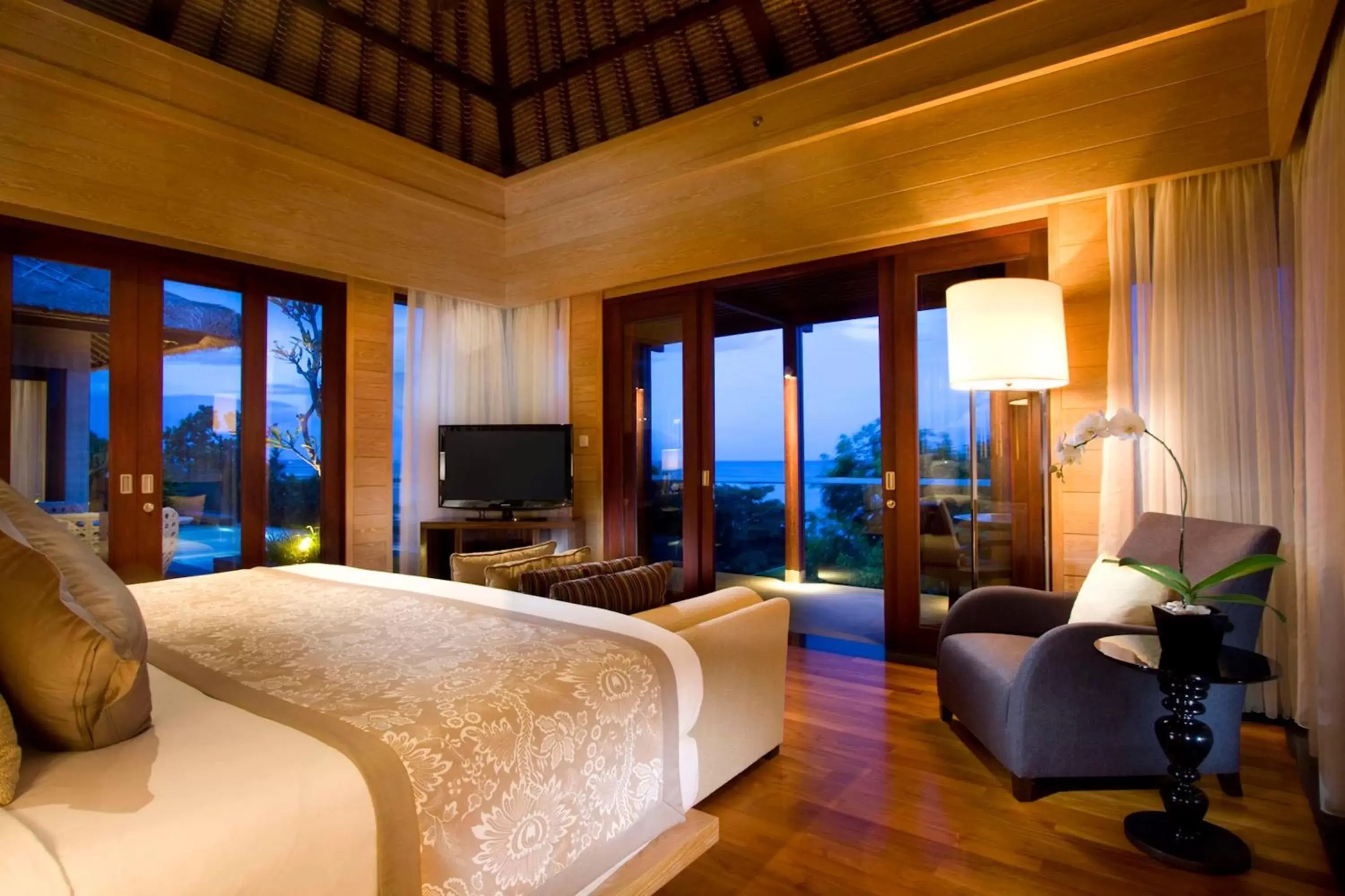 Bed, Seating Area in Conrad Bali